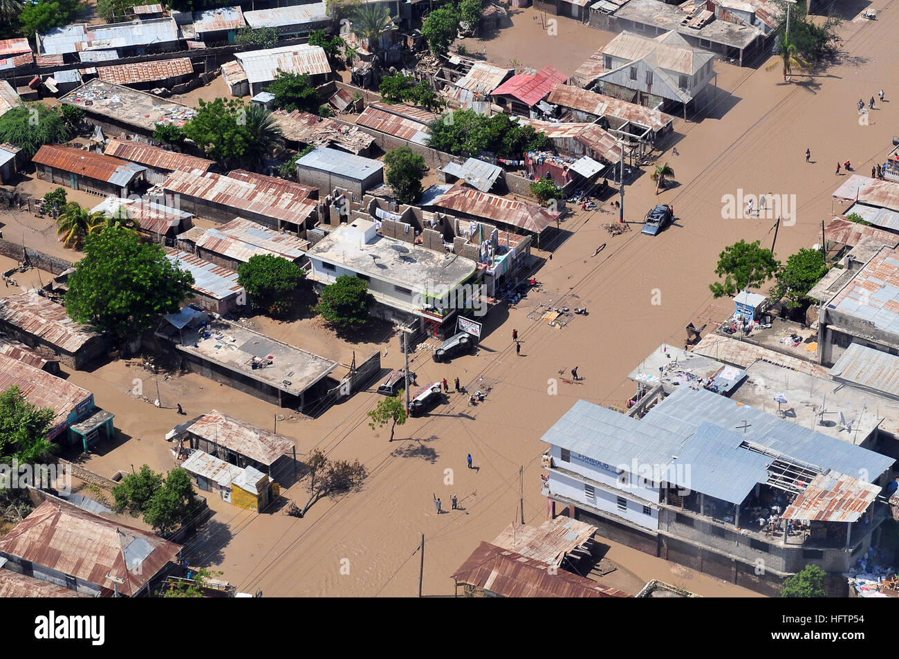 An aerial photograph taken Sept. 9, 2008 of damage in Port-Au-Prince, Haiti caused by Hurricane Ike. The amphibious assault ship USS Kearsarge has been diverted from the scheduled Continuing Promise 2008 humanitarian assistance deployment in the western Caribbean to conduct hurricane relief operations in Haiti. USS Kearsarge Aids Haiti in Disaster Relief DVIDS114537 Stock Photo