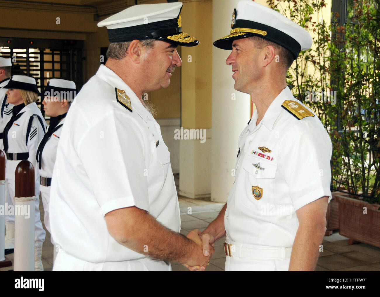 090909-N-6138K-001:  NAPLES, Italy (August 13, 2009) – Vice Adm. George Karamalikis, chief of the Hellenic Navy general staff, is greeted by Rear Adm. John Richardson, deputy commander of U.S. 6th Fleet, upon arrival here.  Karamalikis is in Naples as part of a visit with locally-based U.S. Navy and NATO leadership.  Karamalikis' visit demonstrates the strong and evolving relationship between the U.S. and Hellenic navies.  U.S. Navy photo by Mass Communication Specialist 1st Class (SW) Gary Keen Vice Adm. George Karamalikis & Rear Adm. John Richardson Stock Photo