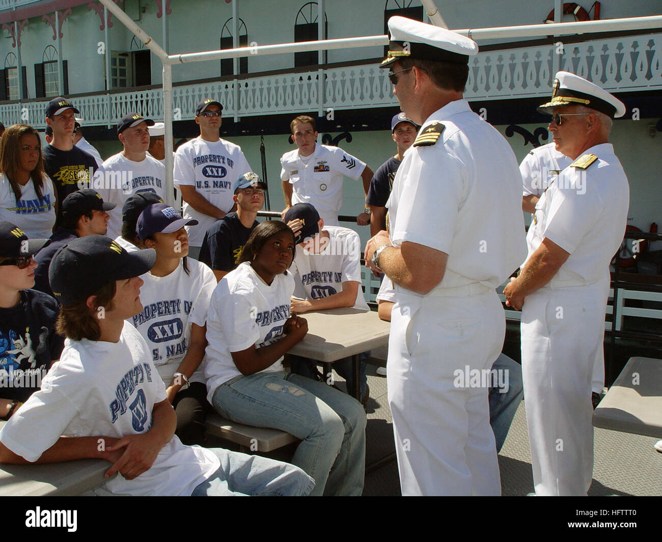 070711-N-2888Q-007  DETROIT (July 11, 2007) - Commander, Naval Surface Forces, Vice Adm. Terrance Etnyre (center) and Commanding Officer, Navy Recruiting District Michigan, Cmdr. Greg Maguire talk to a group of Delayed Entry Program members aboard U.S. Naval Sea Cadet training ship Grayfox (TWR 825). Grayfox is conducting cruises at part of Navy Week Detroit. The week is one of 26 Navy Weeks planned across America in 2007. Navy Weeks are designed to show Americans the investment they have made in their Navy and increase awareness in cities that do not have a significant Navy presence. U.S. Nav Stock Photo