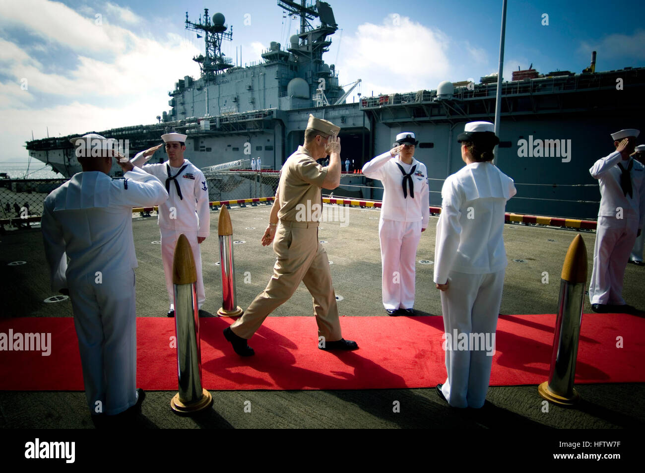 070719-N-0696M-703 SAN DIEGO (July 19, 2007) - Chief of Naval Operations (CNO) Adm. Mike Mullen departs amphibious assault ship USS Boxer (LHD 4) after an all hands call aboard the ship. U.S. Navy photo by Mass Communication Specialist 1st Class Chad J. McNeeley (RELEASED) US Navy 070719-N-0696M-703 Chief of Naval Operations (CNO) Adm. Mike Mullen departs amphibious assault ship USS Boxer (LHD 4) Stock Photo