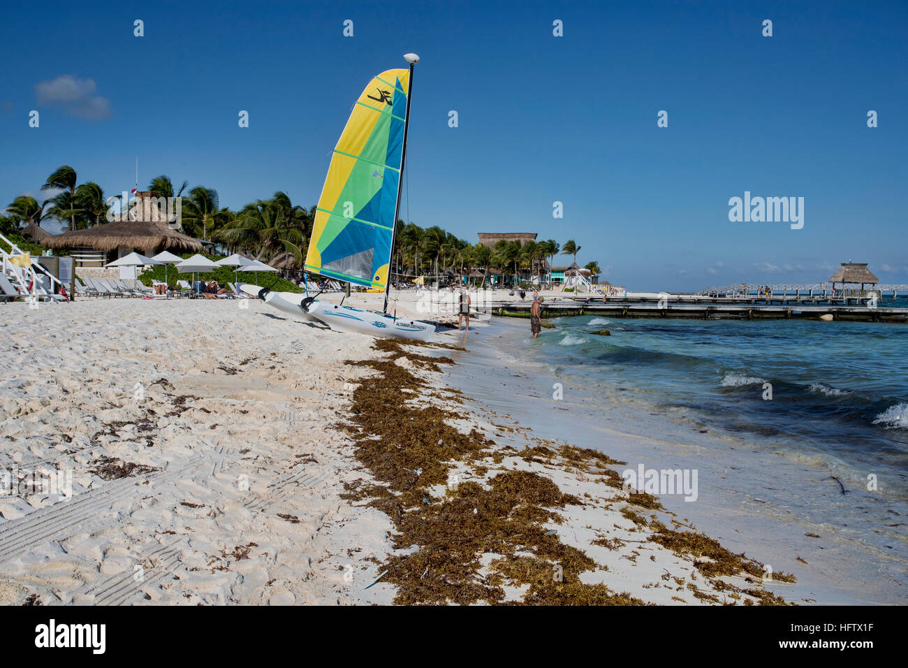 Mexico Caribbean Ocean beach pier vacation. Luxury resort Mexican Mayan Riviera Cancun. Swimming , beach, tropical jungle activities. Stock Photo