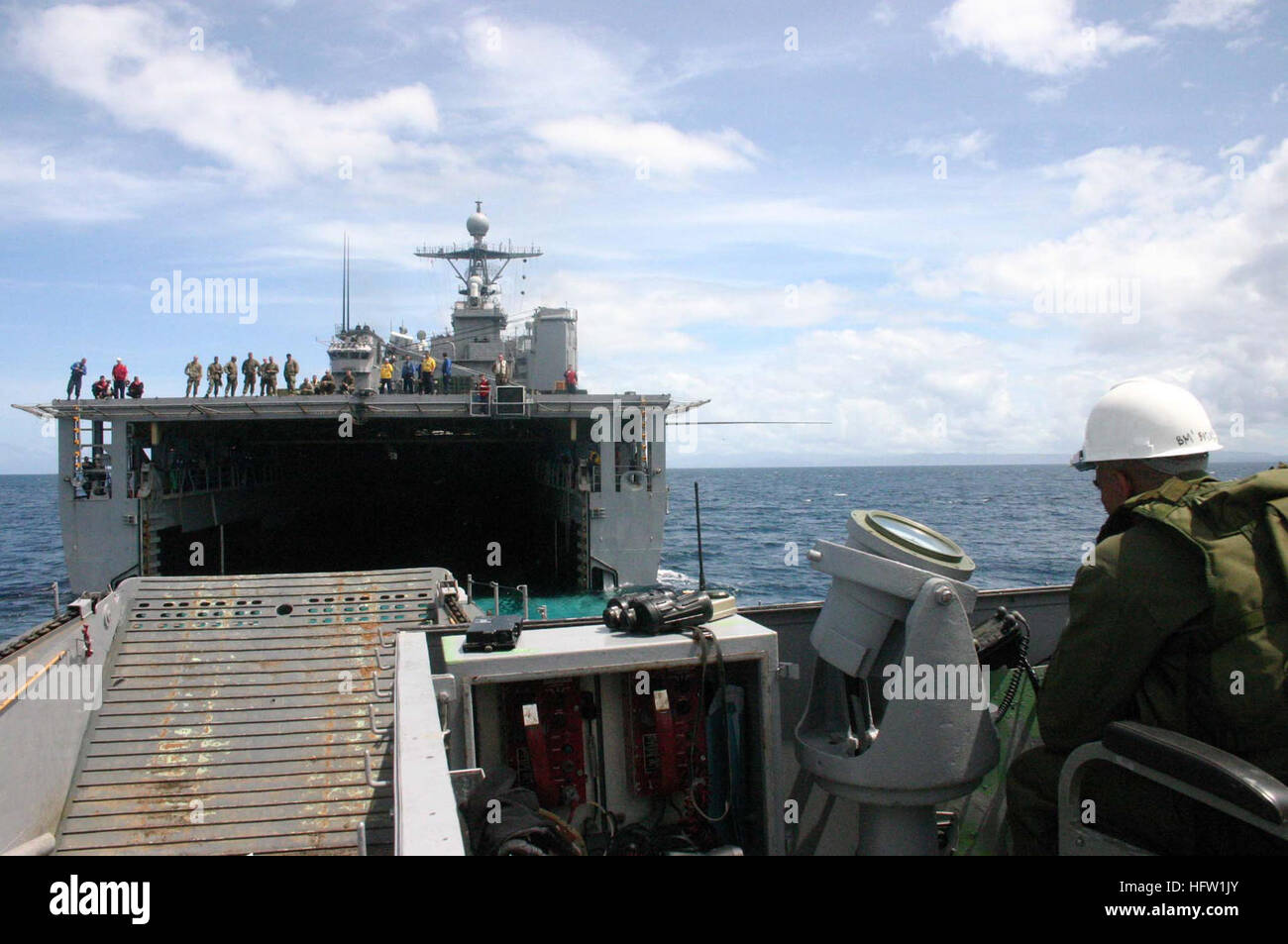 060222-N-6274T-024 Southern Leyte, Republic of the Philippines (Feb. 22, 2006) - The craftmaster assigned to Landing Craft Utility One Six Two Seven (LCU-1627) prepares to enter the amphibious dock landing ship USS Harpers Ferry (LSD 49) well deck to pick up personnel from the 31st Marine Expeditionary Unit (MEU). Sailors and Marines from the Forward Deployed Amphibious Ready Group (ARG) with elements of the 31st Marine Expeditionary Unit (MEU), Joint Task Force (JTF) Balikatan and the USS Curtis Wilbur (DDG 54) arrived off the coast of Leyte Feb. 19 to provide humanitarian assistance and disa Stock Photo