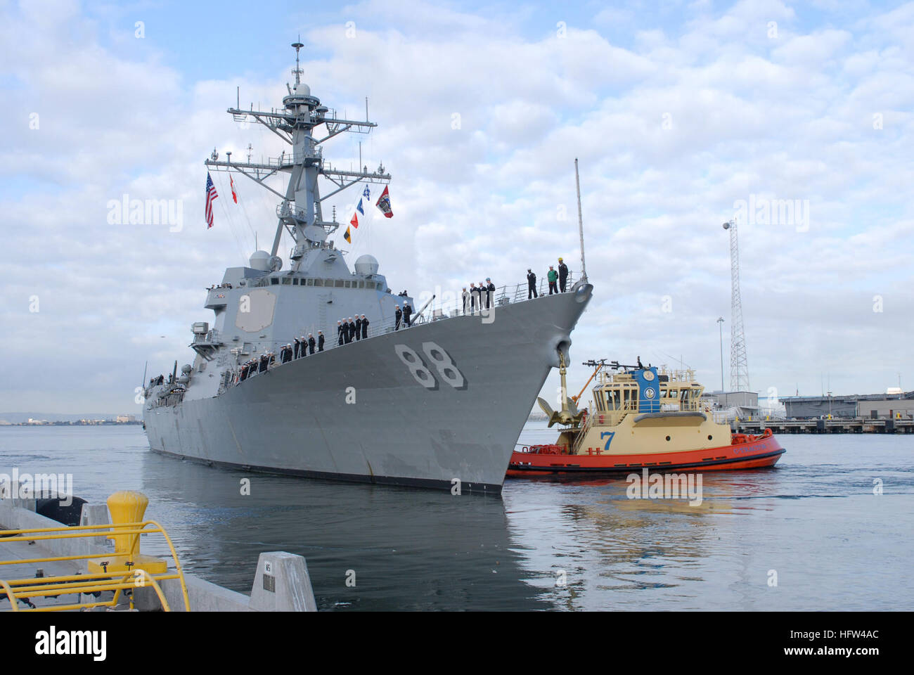 070120-N-9195K-030 San Diego (Jan. 20, 2007) - A tug boat pulls along side the guided missile destroyer USS Preeble (DDG 88) as it departs Naval Base San Diego. Prebble will be forward deployed to the gulf in support of the global war on terrorism. U.S. Navy photo by Mass Communication Specialist 3rd Class Patrick M. Kearney (RELEASED) US Navy 070120-N-9195K-030 A tug boat pulls along side the guided missile destroyer USS Preble (DDG 88) as it departs Naval Base San Diego Stock Photo