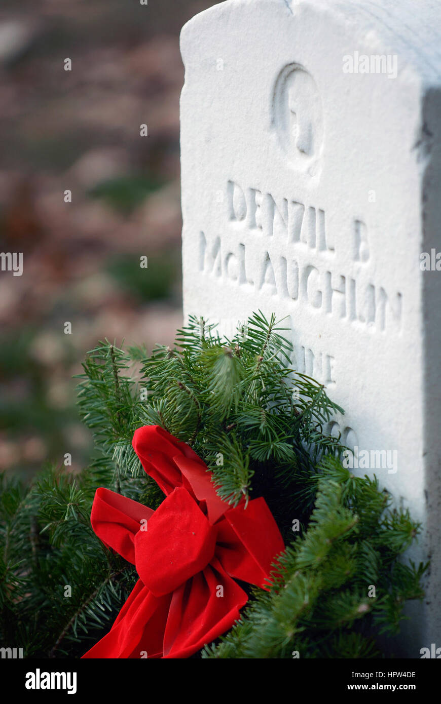 Marlborough scouts place flags on veterans' graves