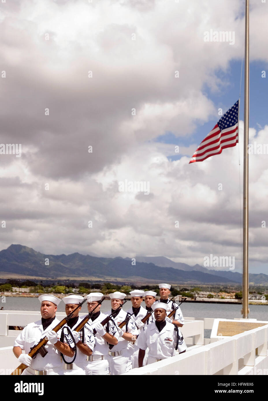 080611-N-0995C-001 FORD ISLAND, Hawaii (June11, 2008) Members of the Navy ceremonial guards post after an interment ceremony at the USS Utah Memorial on Ford Island at Naval Station Pearl Harbor. The ceremony was held to honor Petty Officer First Class Jimmy Oberto, a crewmember of the Florida-class dreadnaught battleship USS Utah (BB 31/AG 16) during the Pearl Harbor attack. U.S. Navy photo by Mass Communication Specialist Third Class Eric J. Cutright (Released) US Navy 080611-N-0995C-001 Members of the Navy ceremonial guards post after an interment ceremony at the USS Utah Memorial on Ford I Stock Photo