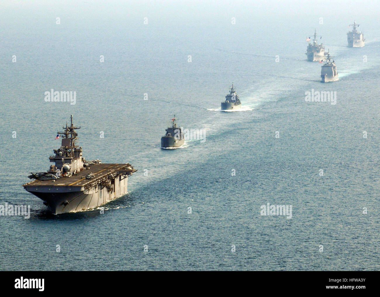 100208-N-9418A-520 GULF OF THAILAND (Feb. 8, 2010) The forward-deployed amphibious assault ship USS Essex (LHD 2), the Royal Thai navy medium landing ship HTMS Surin (LST 722), the Republic of Korea navy tank landing ship Seongin Bong (LST 685), the Ticonderoga-class guided-missile cruiser USS Shiloh (CG 67), the forward-deployed amphibious dock landing ship USS Harpers Ferry (LSD 49) and the forward-deployed amphibious transport dock ship USS Denver (LPD 9) transit in formation in the Gulf of Thailand during exercise Cobra Gold 2010. (U.S. Navy photo by Mass Communication Specialist 3rd Class Stock Photo