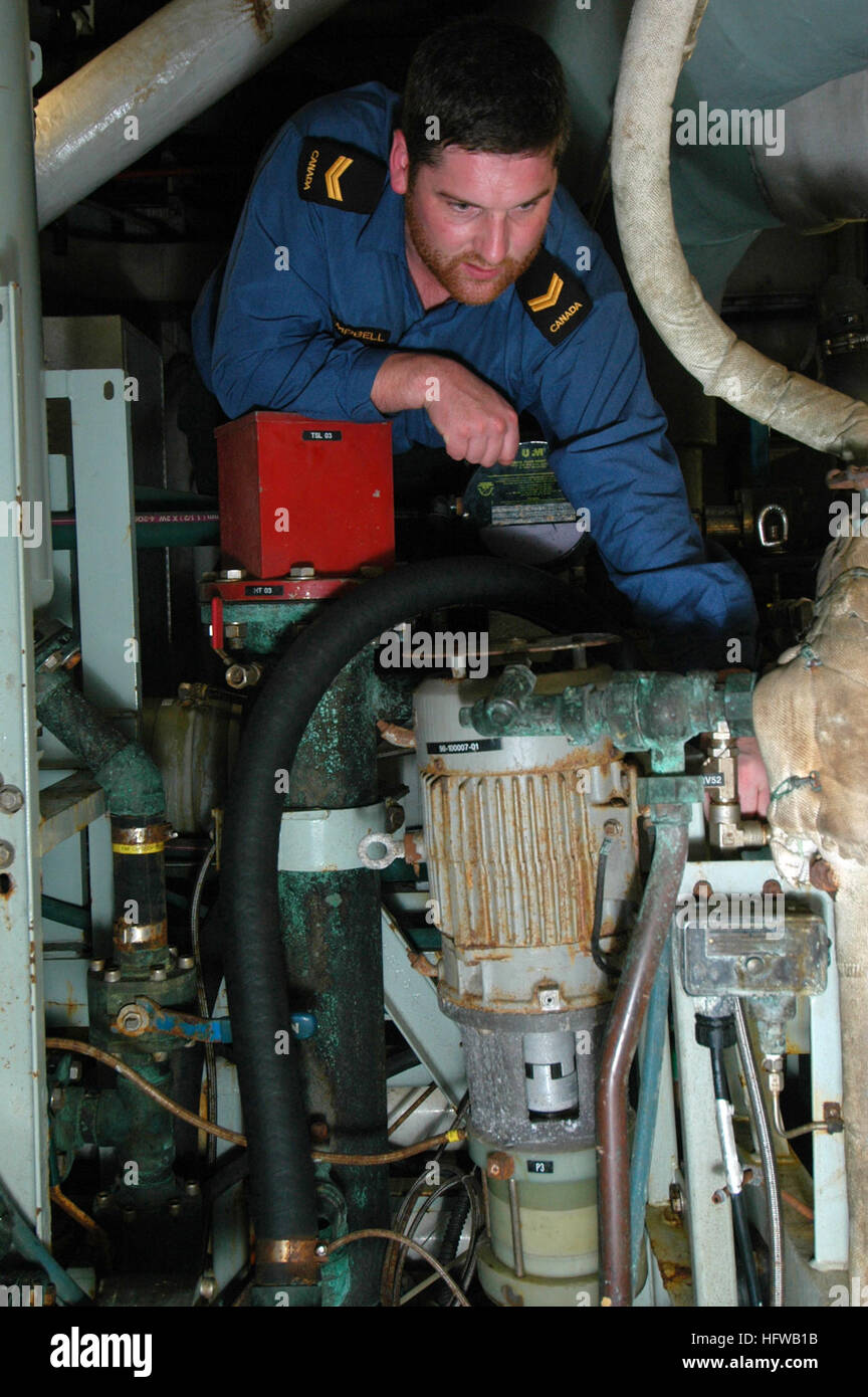 080721-N-8854R-009 PACIFIC OCEAN (July 21, 2008) Leading Seaman Drew Campbell, from Sooke, British Colombia, checks systems in the main space aboard the Canadian frigate HMCS Regina (FFH-334). Regina is participating in the Rim of the Pacific (RIMPAC) 2008. RIMPAC is the worldÕs largest multinational exercise and is scheduled biennially by the U.S. Pacific Fleet. Participants include the United States, Australia, Canada, Chile, Japan, Netherlands, Peru, Republic of Korea, Singapore, and the United Kingdom. (U.S. Navy Photo by Mass Communication Specialist 3rd Class Matthew Reinhardt/Released)  Stock Photo