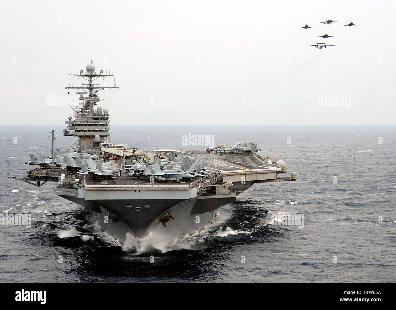 French F-2 Rafale M, E-2C Hawkeye, and American F/A-18 Super Hornet ...
