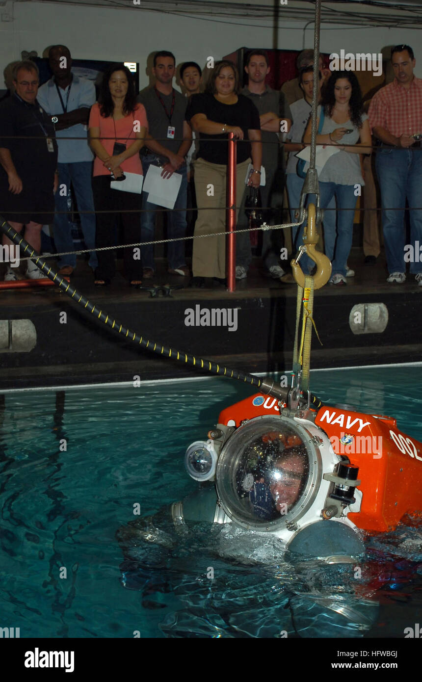 080801-N-8421M-033 SAN DIEGO (Aug. 1, 2008) Navy Diver Senior Chief Daniel Jackson, assigned to Deep Submergence Unit (DSU) is lowered into the water while piloting an atmospheric diving system (ADS) 2000 during the unit's 2nd annual Submarine Rescue Day at Naval Air Station North Island. DSU is the only operator of this type of ADS system in the world, which is capable of safely operating at depths of up to 2000 feet. (U.S. Navy photo by Mass Communications Specialist 1st Class David Mercil/Released) US Navy 080801-N-8421M-033 Navy Diver Senior Chief Daniel Jackson, assigned to Deep Submergen Stock Photo