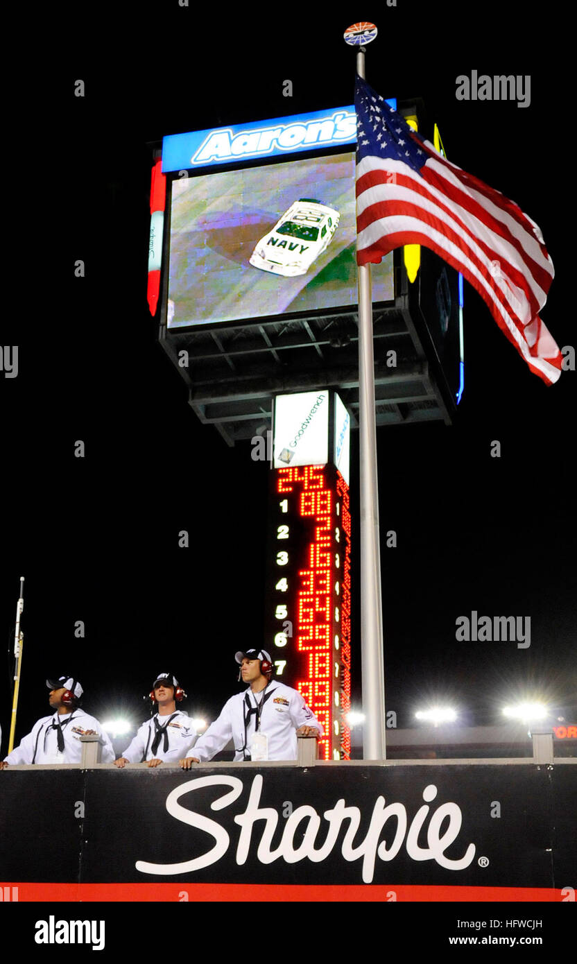 080822-N-5345W-148 BRISTOL, Tenn. (Aug. 22, 2008) Sailors from Riverine Squadron (RIVRON) 1 watch from the infield tower as NASCAR Nationwide Series driver Brad Keselowski pilots the No. 88 U.S. Navy Chevrolet Monte Carlo around 'The World's Fastest Half Mile' in the closing laps of the Food City 250 at Bristol Motor Speedway in Bristol. Keselowski overcame a 37th place starting position and fought his way to his second career victory while winning second place overall in the nationwide championship standings. (U.S. Navy photo by Mass Communication Specialist 2nd Class Kristopher S. Wilson/Rel Stock Photo