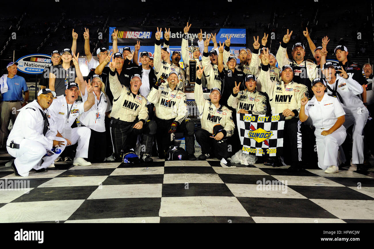 080822-N-5345W-262 BRISTOL, Tenn. (Aug. 22, 2008) Sailors assigned to Riverine Squadron (RIVRON) 1 celebrate in victory lane with the JR Motorsports U.S. Navy team after driver Brad Keselowski raced the No. 88 U.S. Navy Chevrolet Monte Carlo to victory in the NASCAR Nationwide Series Food City 250 at Bristol Motor Speedway in Bristol, Tenn. Keselowski overcame a 37th place starting position to claim his second career victory and won second place overall in the nationwide championship standings. (U.S. Navy photo by Mass Communication Specialist 2nd Class Kristopher S. Wilson/Released) US Navy 0 Stock Photo