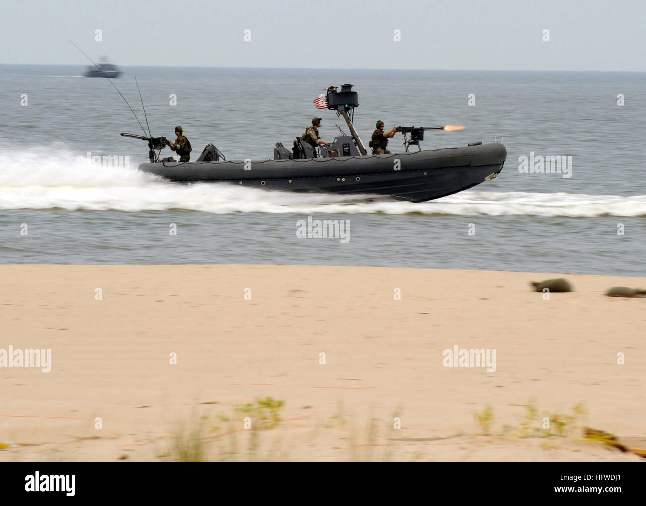 100717-N-8949D-327 VIRGINIA BEACH, Va. (July 17, 2010) Special Warfare Combatant-craft Crewmen assigned to Special Boat Team (SBT) 20 perform a capability demonstration at Joint Expeditionary Base Little Creek-Fort Story. The Naval Special Warfare community displayed its capabilities as part of the 41st UDT-SEAL East Coast Reunion celebration. Events are planned throughout the weekend to honor UDT/SEAL history, heritage, and families. (U.S. Navy photo by Mass Communication Specialist 2nd Class Matt Daniels/Released) US Navy 100717-N-8949D-327 Special Warfare Combatant-craft Crewmen assigned to Stock Photo
