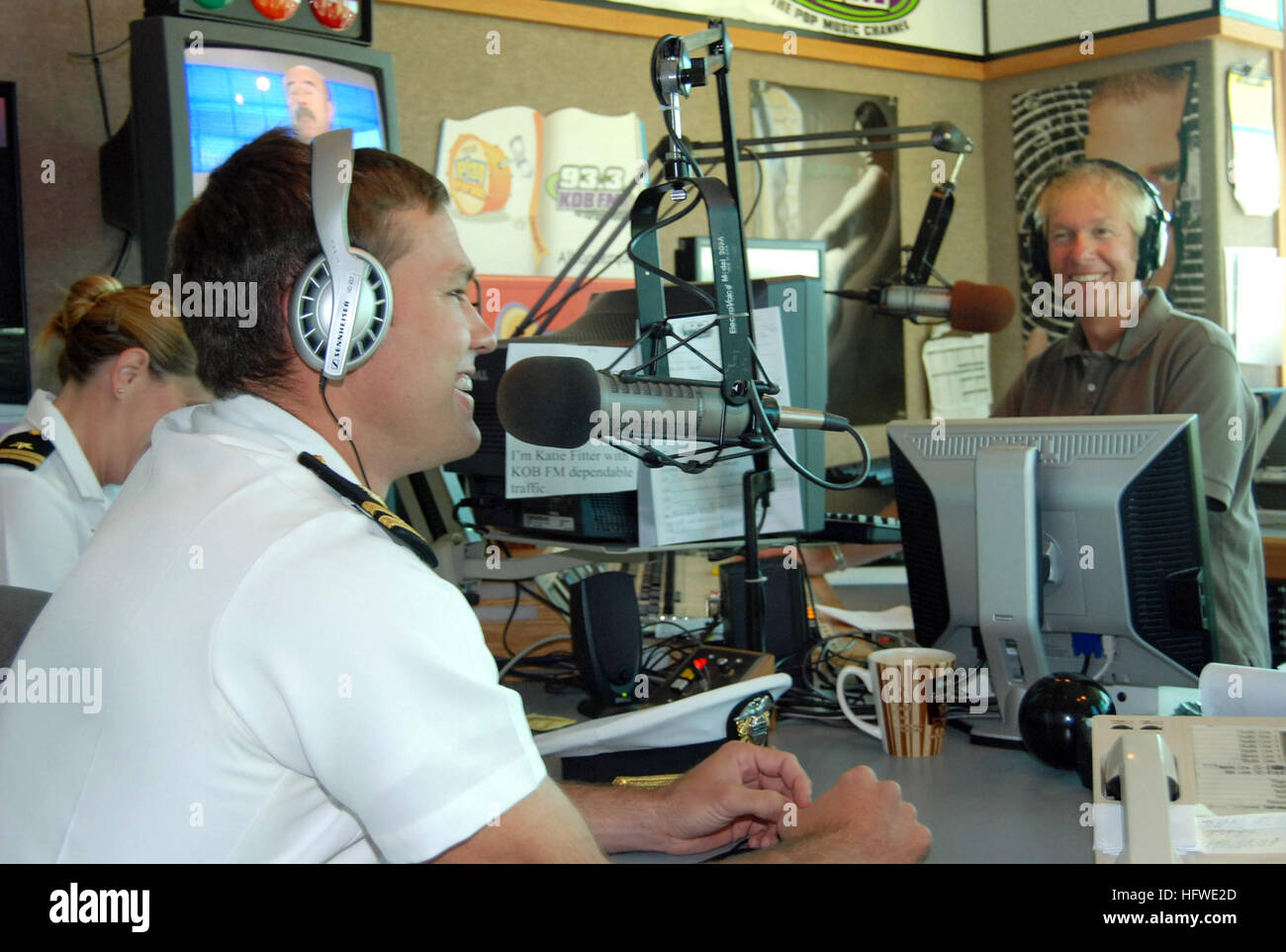 080916-N-5324D-014 ALBUQUERQUE, NM (Sept. 16, 2008) Lt. Andrew Baldwin, M.D., assigned to the Navy Bureau of Medicine and Surgery, is interviewed by John Forsythe on KKOB FM 93.3Õs ÒJohn and the Pop TartsÓ morning show. Baldwin, formerly of the ABC TV series ÒThe Bachelor,Ó is speaking at events with Albuquerque Navy Week, one of 22 weeks planned across America in 2008. Navy Weeks are designed to increase awareness in metropolitan areas that do not have a significant Navy presence. (U.S. Navy photo by Mass Communication Specialist 1st Class Janine Deneault/Released) US Navy 080916-N-5324D-014  Stock Photo