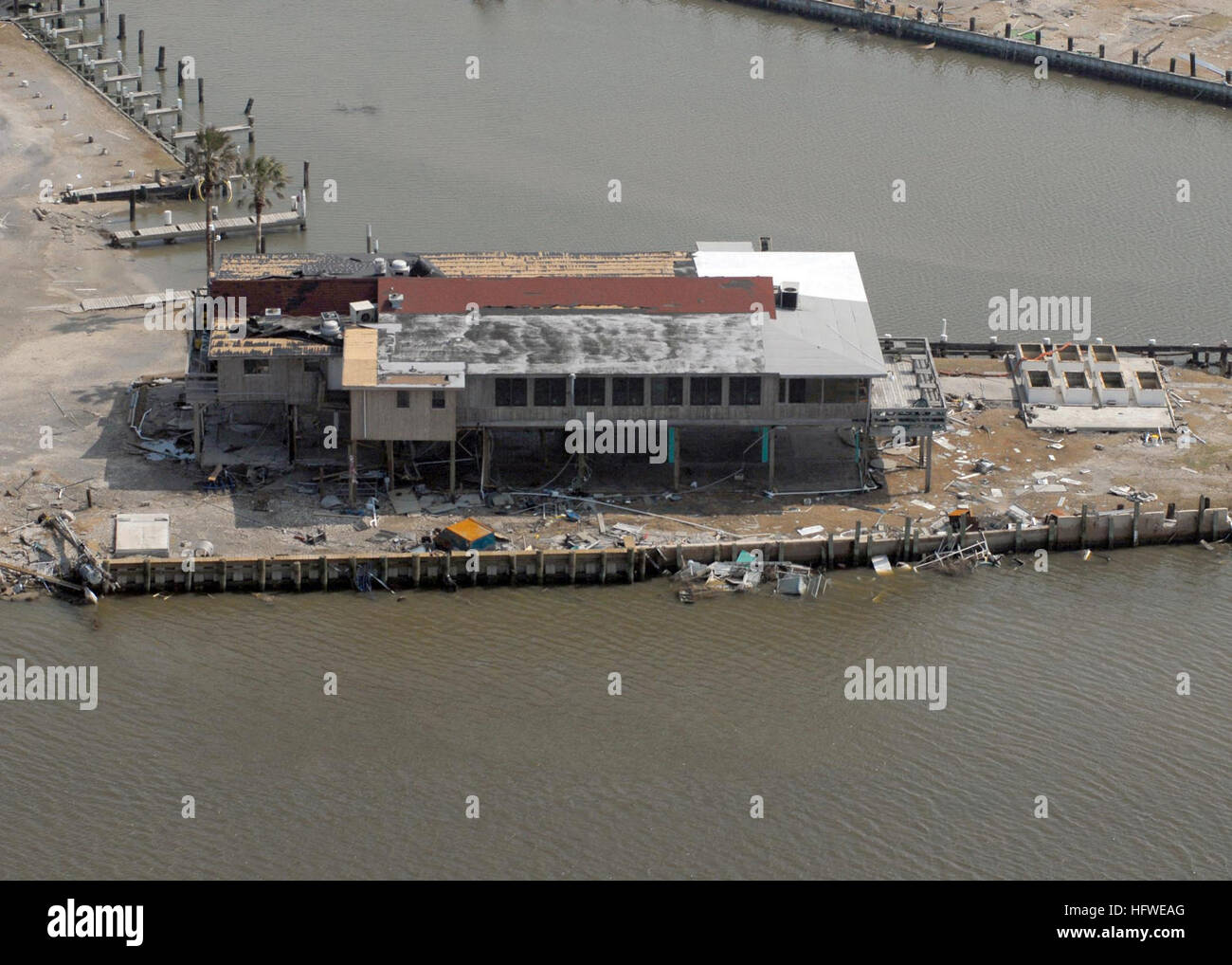 080919-N-6575H-750 GALVESTON, Texas (Sept. 19, 2008) A damaged boathouse on the Bolivar Peninsula in Galveston, Texas, is visible in this aerial photograph. Hurricane Ike struck the Texas Gulf Coast as a strong category 2 storm Sept. 13, causing wide-spread damage to the region. (U.S. Navy photo by Chief Mass Communication Specialist Chris Hoffpauir/Released) US Navy 080919-N-6575H-750 A damaged boathouse on the Bolivar Peninsula in Galveston, Texas, is visible in this aerial photograph Stock Photo