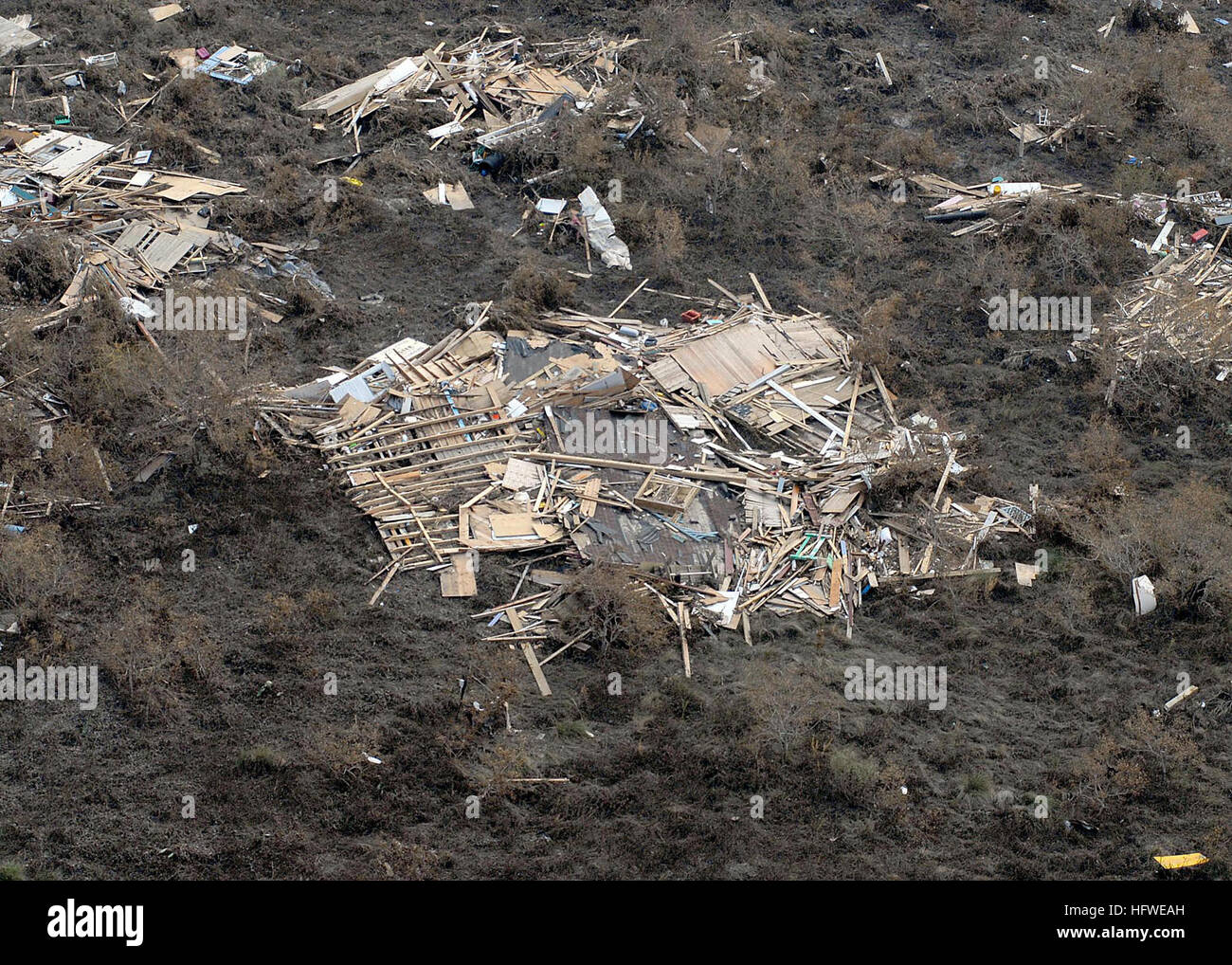 080919-N-6575H-728 GALVESTON, Texas (Sept. 19, 2008) The wreckage of a home on the Bolivar Peninsula in Galveston, Texas, is shown in this aerial photograph. Hurricane Ike struck the Texas Gulf Coast as a strong category 2 storm Sept. 13, causing wide-spread damage to the region. (U.S. Navy photo by Chief Mass Communication Specialist Chris Hoffpauir/Released) US Navy 080919-N-6575H-728 The wreckage of a home on the Bolivar Peninsula in Galveston, Texas, is shown in this aerial photograph Stock Photo