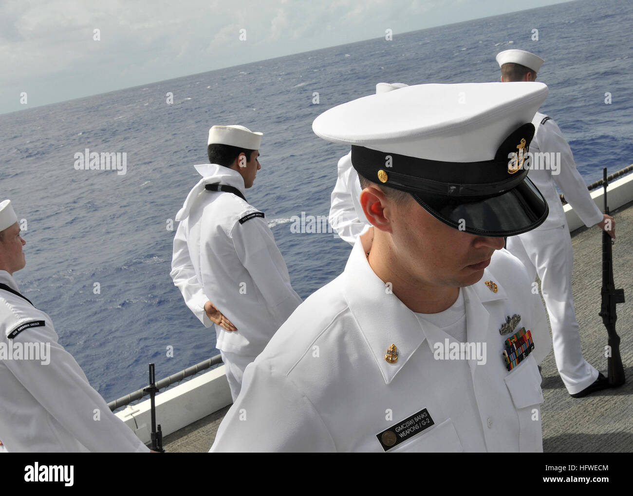Honor guard aboard USS Abraham Lincoln (CVN 72) performs a burial at ...