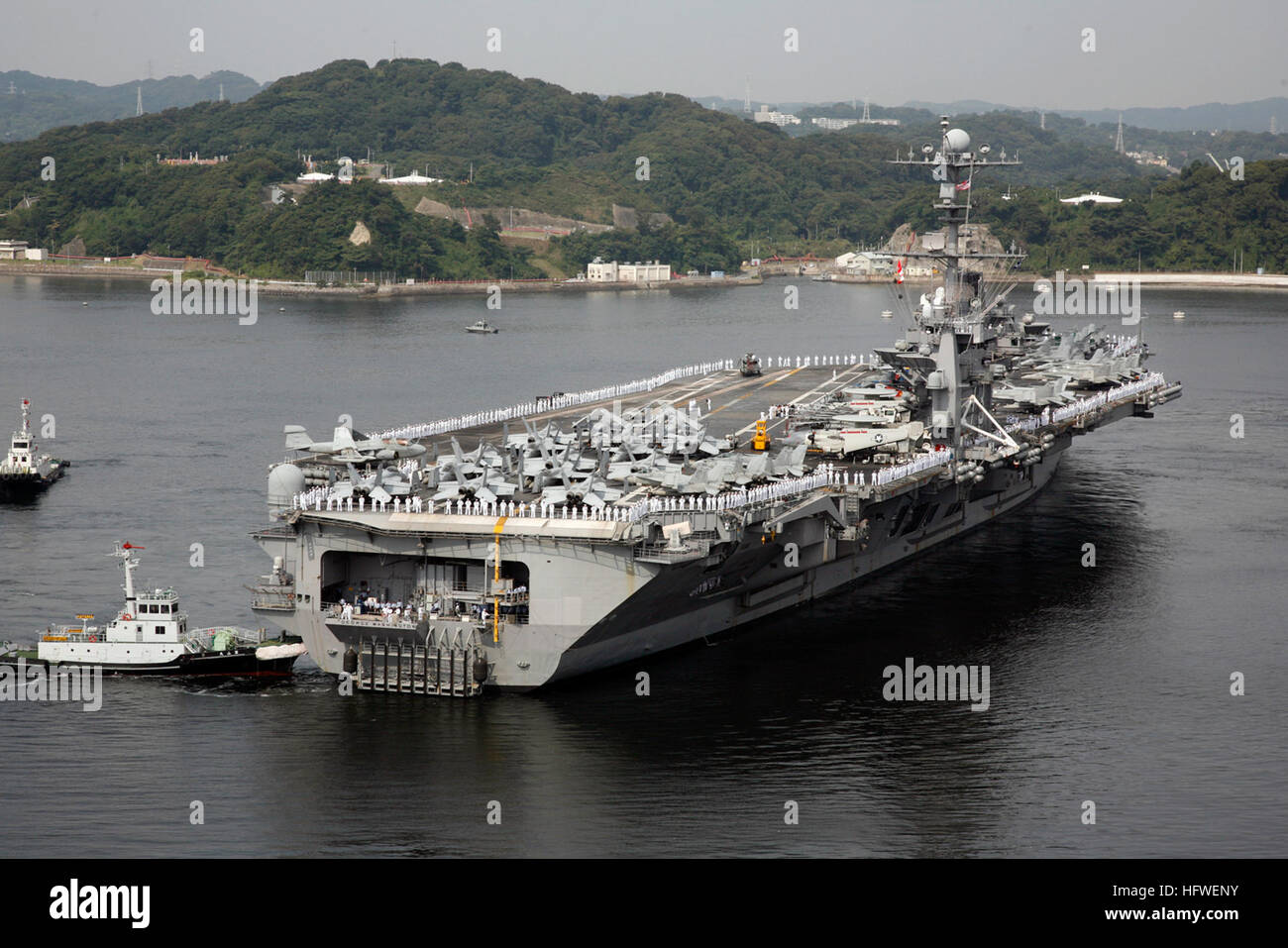 080925-N-XXXXK-005 YOKOSUKA, Japan (Sept. 25, 2008) The aircraft carrier  USS George Washington (CVN 73) arrives at Fleet Activities Yokosuka, Japan.  George Washington and Carrier Air Wing 5 will be operating from Fleet