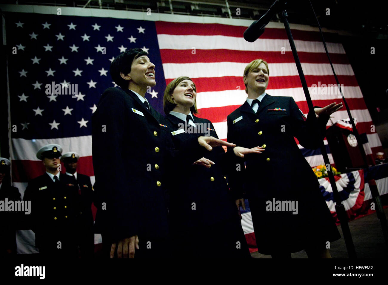 081012-N-5549O-100 NEW YORK (Oct. 12, 2008) The United States Navy Band 'Sea Chanters' sing to a crowd of guests aboard the amphibious assault ship USS Nassau (LHA 4) during a celebration ceremony of the 100th anniversary of the Great White Fleet.  (U.S. Navy photo by Mass Communication Specialist 2nd Class Kevin S. O'Brien/Released) US Navy 081012-N-5549O-100 The United States Navy Band Stock Photo