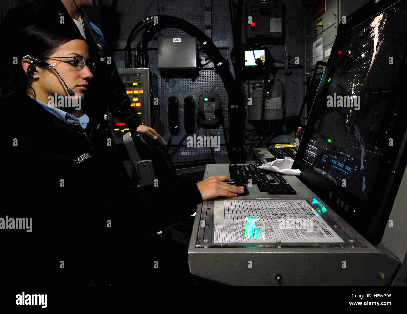 081017-N-9928E-042 PACIFIC OCEAN (Oct. 17, 2008) Air Traffic Controller 2nd Class Valerie Gardner, from Kalamazoo, Mich., stands watch in the carrier air traffic control center aboard the Nimitz-class aircraft carrier USS John C. Stennis (CVN 74). Stennis is part of the John C. Stennis Carrier Strike Group conducting composite training unit exercises off the coast of Southern California.  (U.S. Navy photo by Mass Communication Specialist 3rd Class Josue L. Escobosa/Released) US Navy 081017-N-9928E-042 Air Traffic Controller 2nd Class Valerie Gardner stands watch in the carrier air traffic cont Stock Photo
