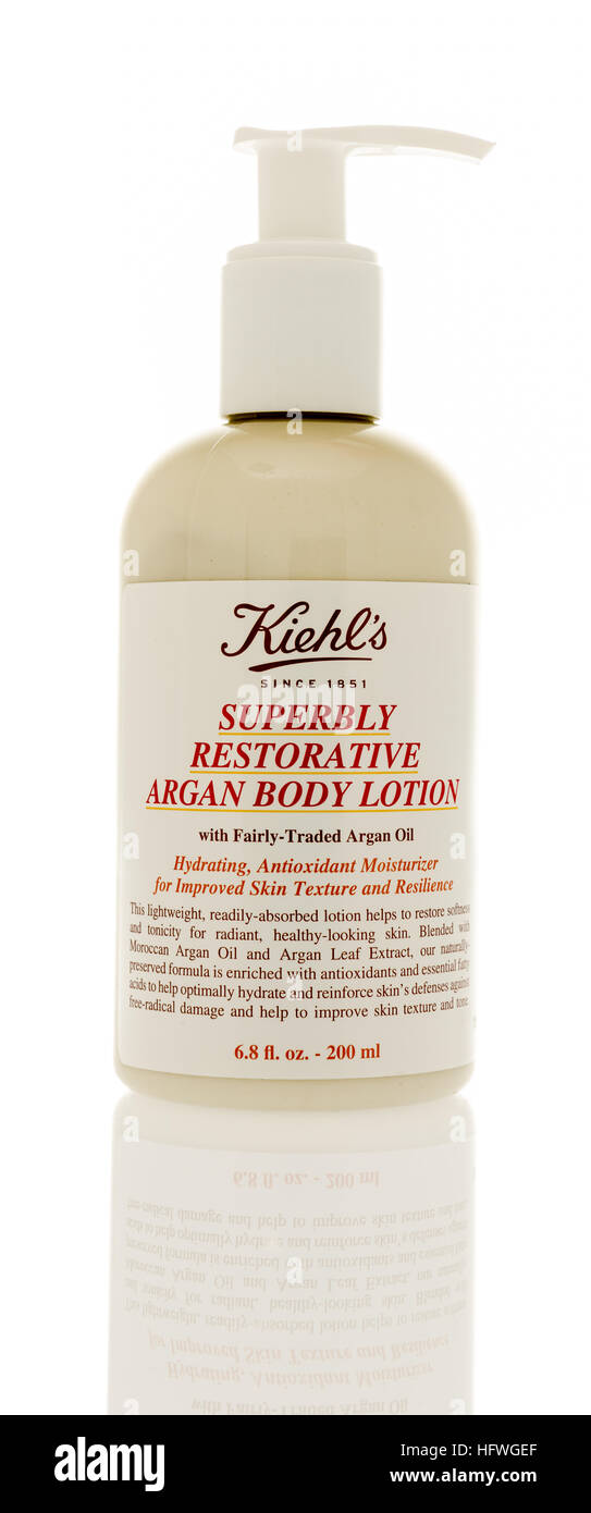Winneconne, WI - 21 December 2016: Bottle of Kiehl's superbly restorative argan body lotion on an isolated background. Stock Photo