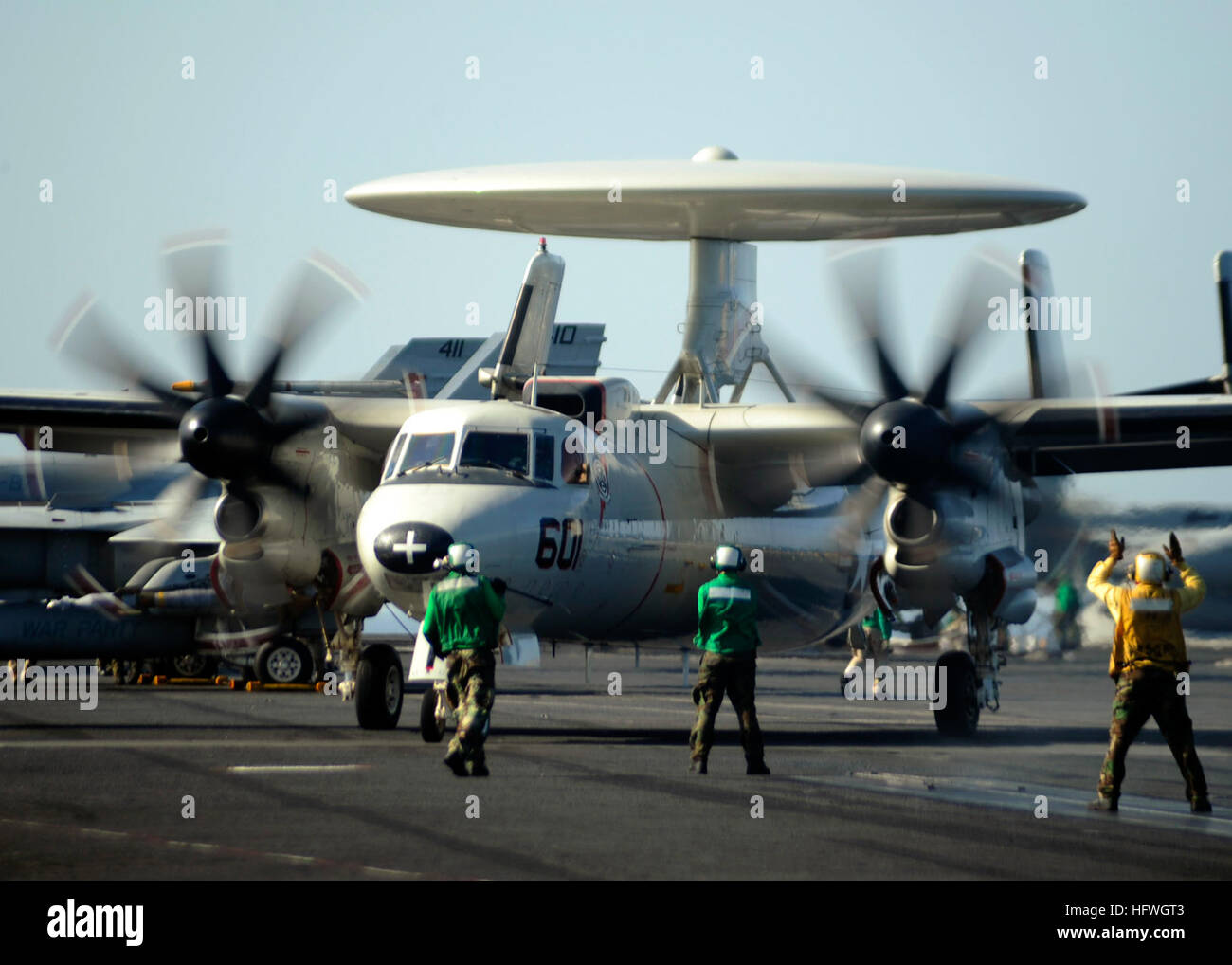 Flight deck personnel aboard Nimitz-class aircraft carrier USS Theodore ...