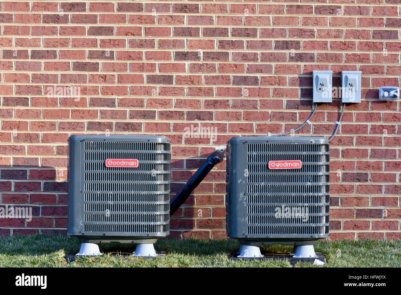 Goodman air conditioning units outside a residential home Stock Photo