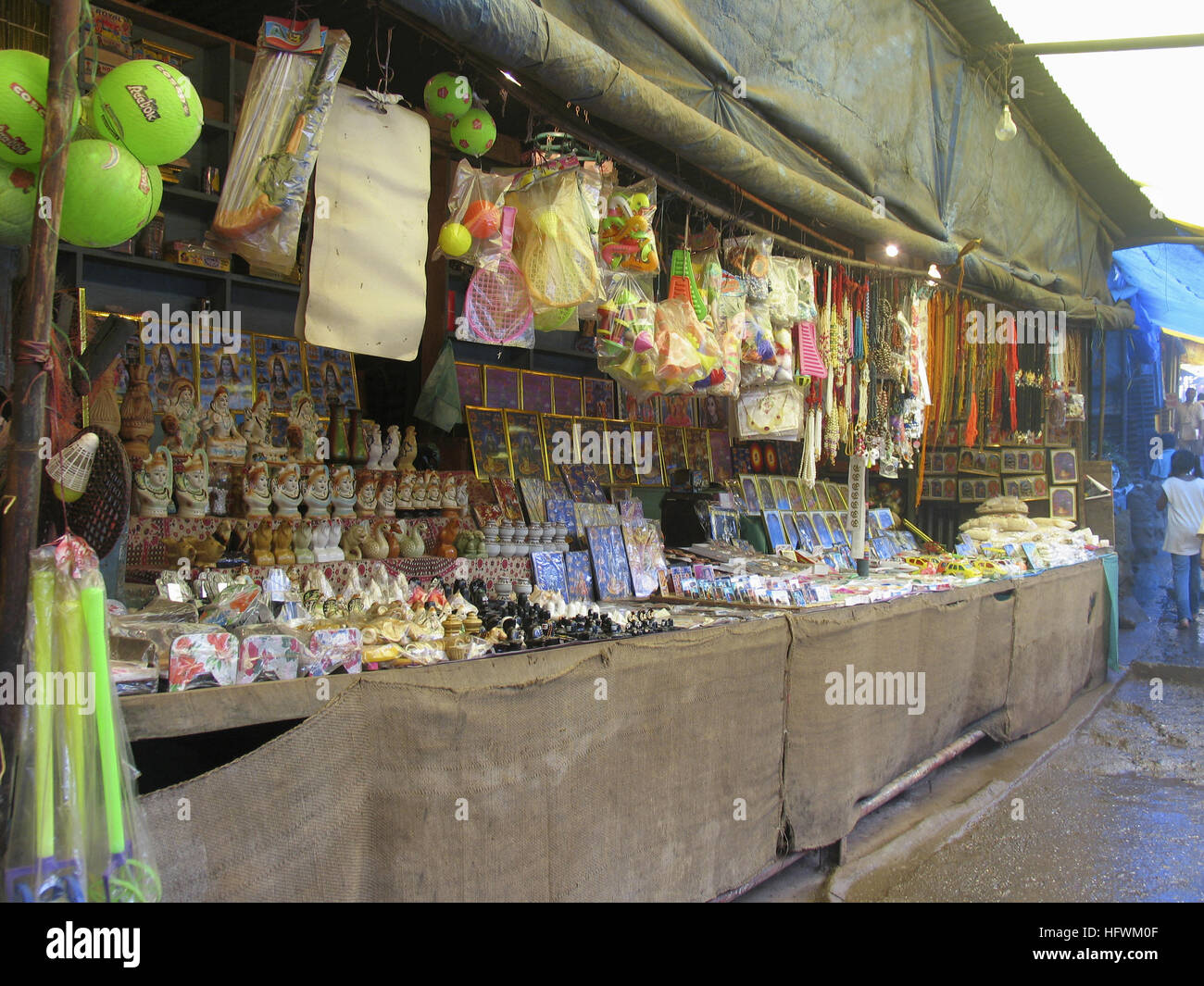 Shops on the pathway to temple. Bhimashankar, Maharashtra. Common scene. Sell the things required for traditional worshipping. Stock Photo