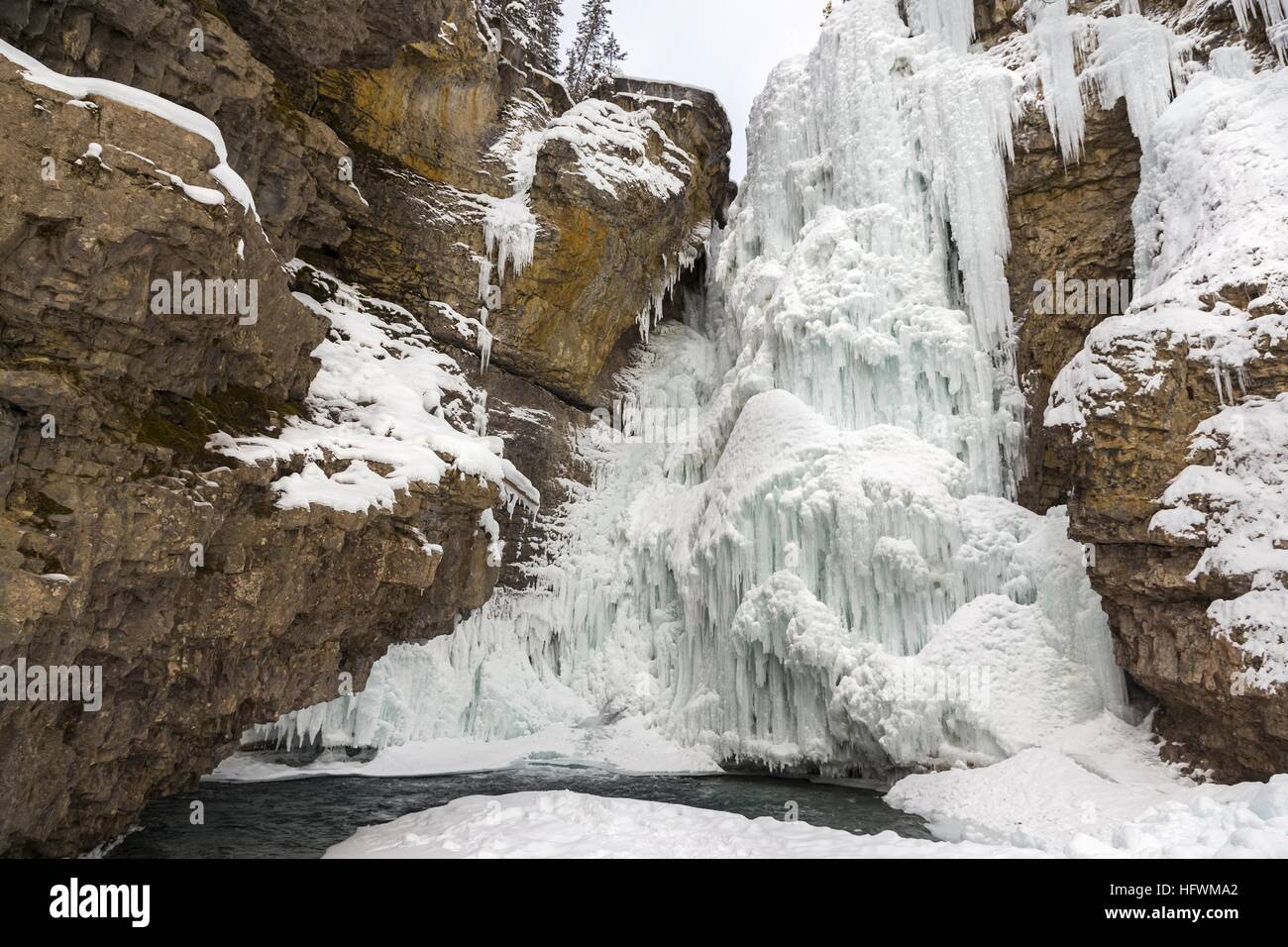 Frozen Ice Waterfall Famous Johnston Canyon Winter Landscape Scenic View. Banff National Park Rocky Mountains Alberta Canada Stock Photo