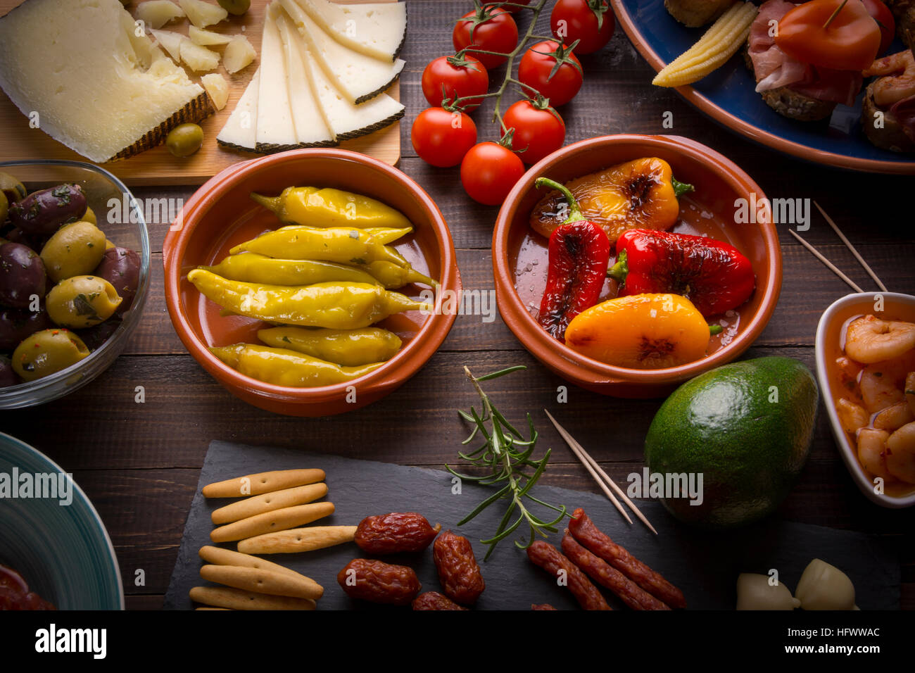 Top view of variety of mediterranean starters - spanish tapas with ...