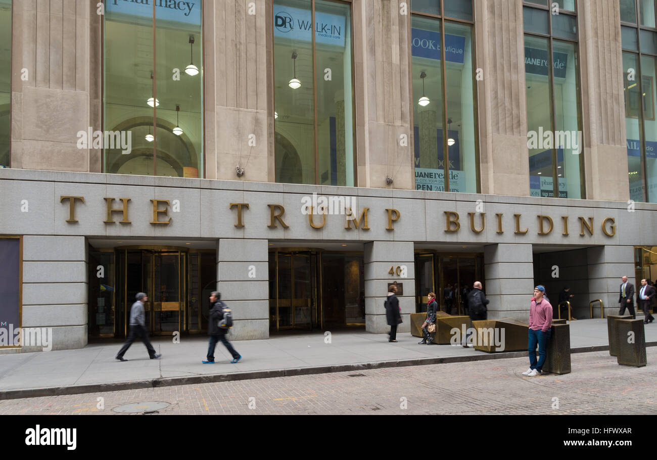 NEW YORK - APRIL 27, 2016:  Entrance of the Trump building with unknown people in front of it Stock Photo