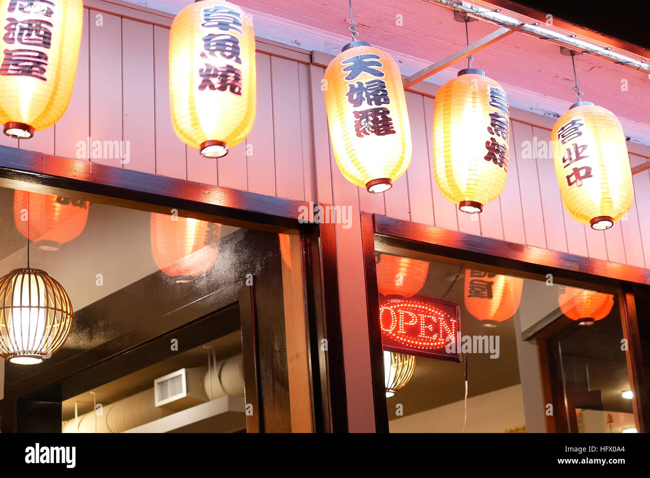 New Westminster, BC, Canada - December 06, 2016 : Line of the red ball paper lanterns in front of Japanese restaurant Stock Photo