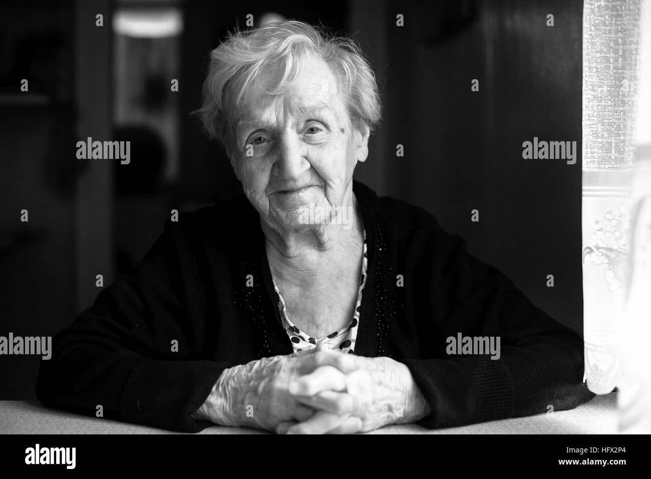 Old lady at window Black and White Stock Photos & Images - Alamy