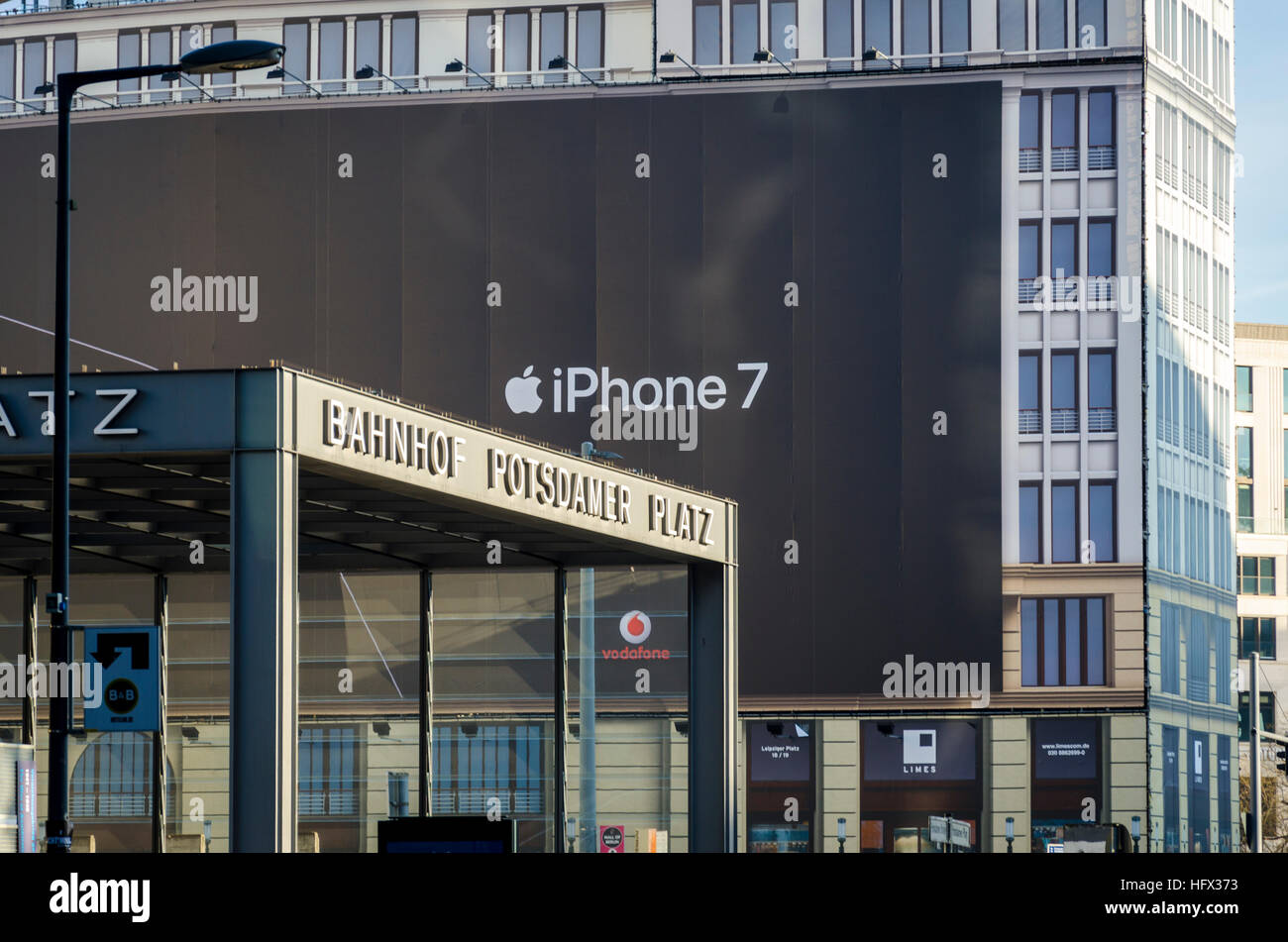 iPhone 7 billboard advertisement behind Potsdamer Platz station, Berlin, Germany Stock Photo