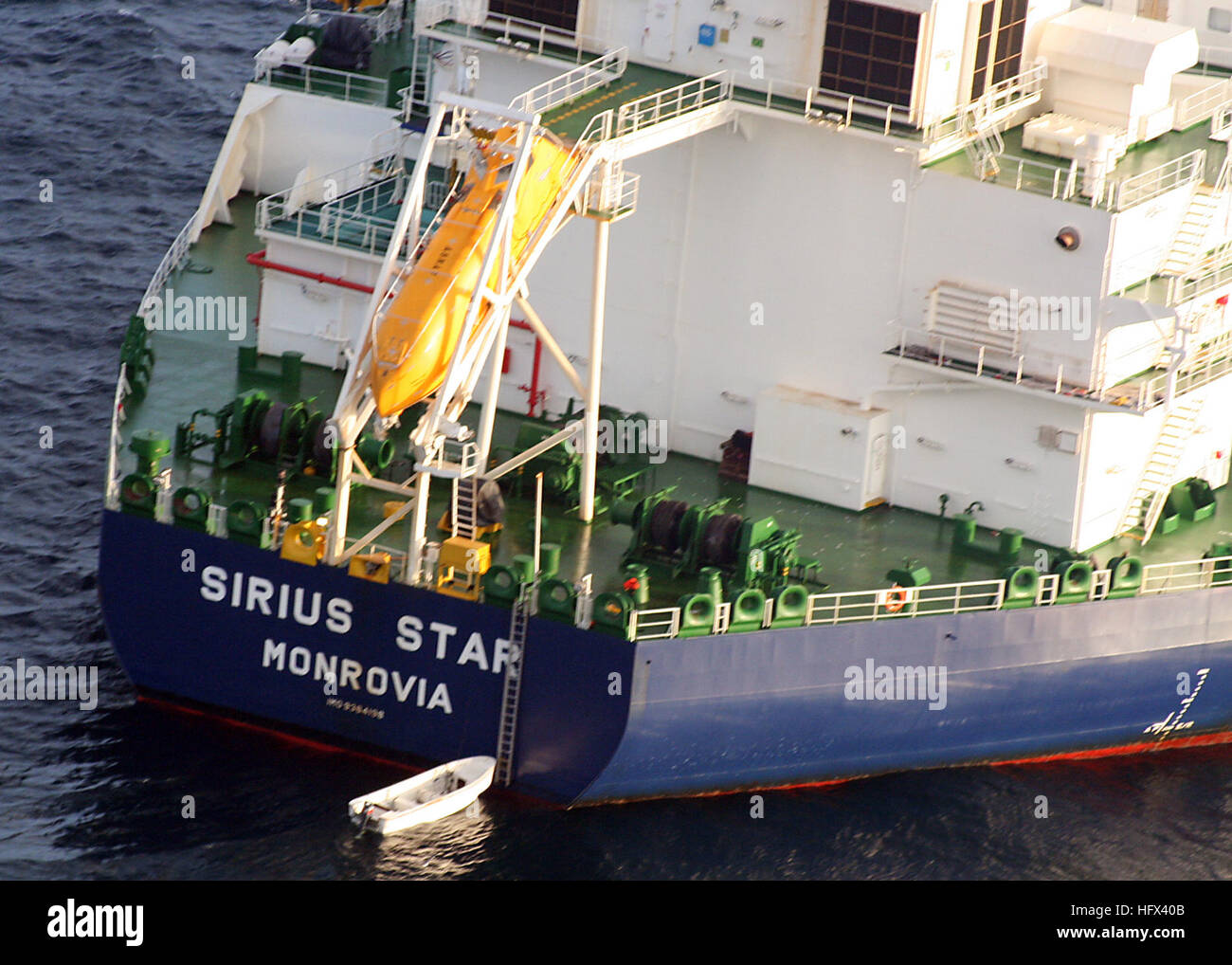 090109-N-5512H-046 SOMALIA (Jan. 9, 2009) The MV Sirius Star is observed at anchor by the U.S. Navy following an apparent payment via a parachuted container to pirates holding the Sirius Star. The U.S. 5th Fleet conducts maritime security operations to promote stability and regional economic prosperity. (U.S. Navy photo by Air Crewman 2nd Class David B. Hudson/Released) US Navy 090109-N-5512H-046 The MV Sirius Star is observed at anchor Stock Photo