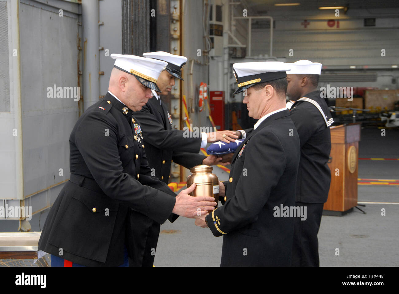 Command Master Chief and Marine Corps personnel conduct burial at sea ...