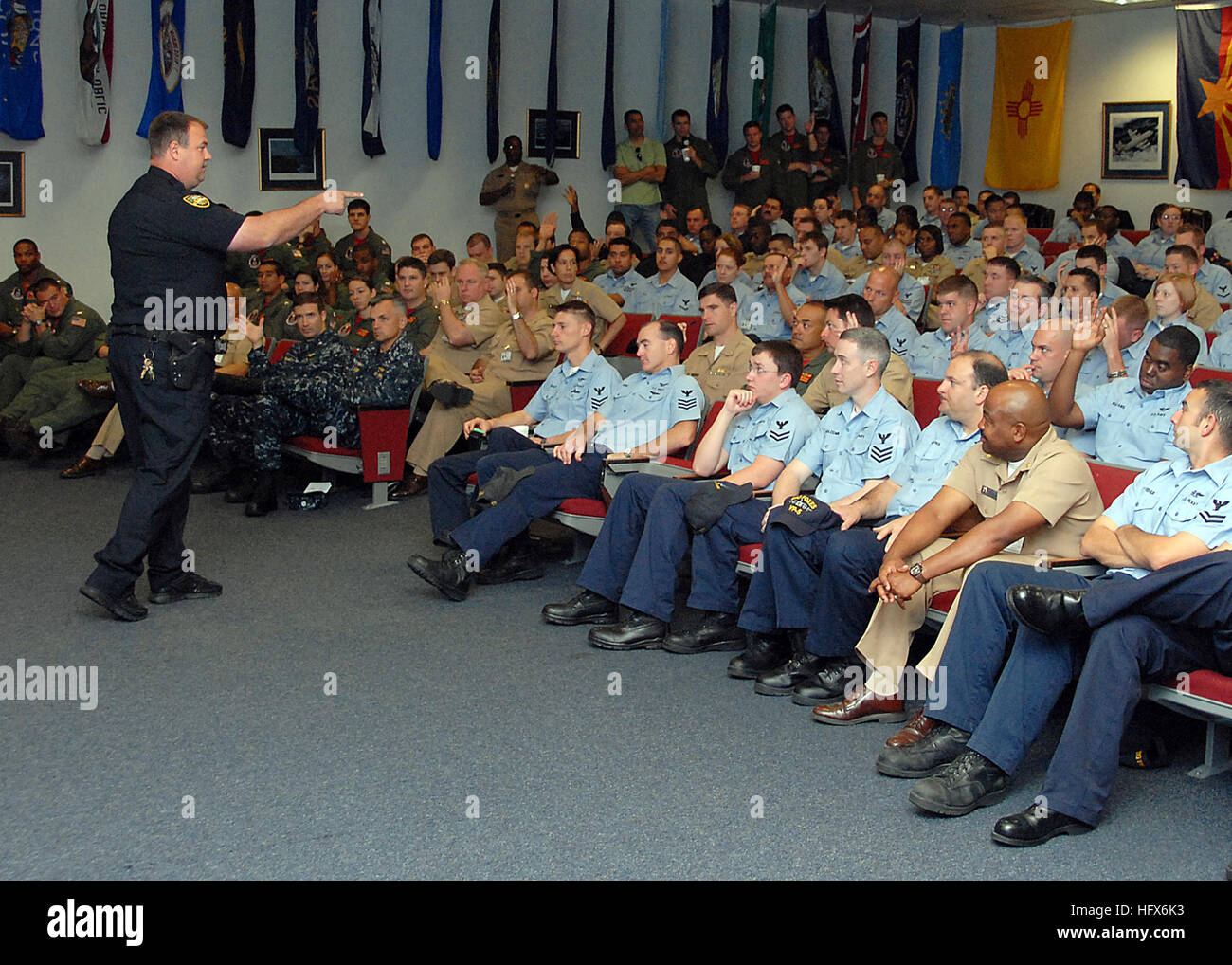 090317-N-3013W-015 JACKSONVILLE, Fla. (March 17, 2009) Deputy Wade Chapman of the Jacksonville Sheriffís Office takes questions from the Sailors assigned to the 'War Eagles' of Patrol Squadron (VP) 16 about Florida state traffic violations. Chapman is volunteering as a presenter during a VP-16 safety stand down. (U.S. Navy photo by Mass Communication Specialist 2nd Class Charles White/Released) US Navy 090317-N-3013W-015 Deputy Wade Chapman of the Jacksonville Sheriff&-195;&-173;s Office takes questions from the Sailors assigned to the Stock Photo
