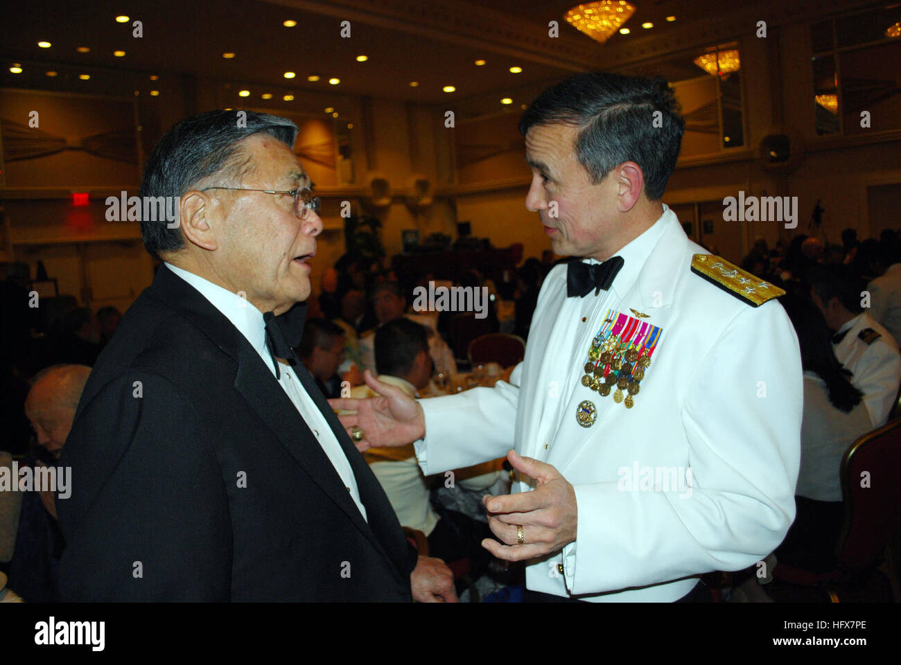 090417-N-9268E-068 WASHINGTON (April 17, 2009) Vice Adm. Harry B. Harris Jr., Deputy Chief of Naval Operations for Communication Networks, speaks with former Secretary of Transportation Norman Y. Mineta during the National Japanese-American Memorial Foundation annual awards gala. Harris is the highest-ranking Japanese-American naval officer and Mineta was the only Democrat to hold a cabinet position in the George W. Bush presidential administration. (U.S. Navy photo by Lt. Karen Eifert/Released) US Navy 090417-N-9268E-068 Vice Adm. Harry B. Harris Jr., Deputy Chief of Naval Operations for Comm Stock Photo