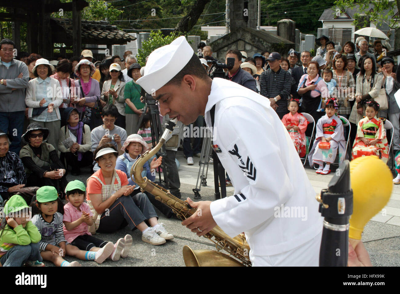 090515-N-9719D-622  SHIMODA, Japan (May 15, 2009) Musician 1st Class Christopher Sams, assigned to the U.S. 7th Fleet Brass Band, performs during the 70th Shimoda Black Ship festival. The band and the guided-missile destroyer USS McCampbell (DDG 8) visited Shimoda to support the festival, which commemorated the 1854 landing of Commodore Matthew Perry and his crew at Shimoda and the subsequent opening of trade between Japan and the West. (U.S. Navy photo by Musician 2nd Class Dirk Denton/Released) US Navy 090515-N-9719D-622 Musician 1st Class Christopher Sams performs during the 70th Shimoda Bl Stock Photo