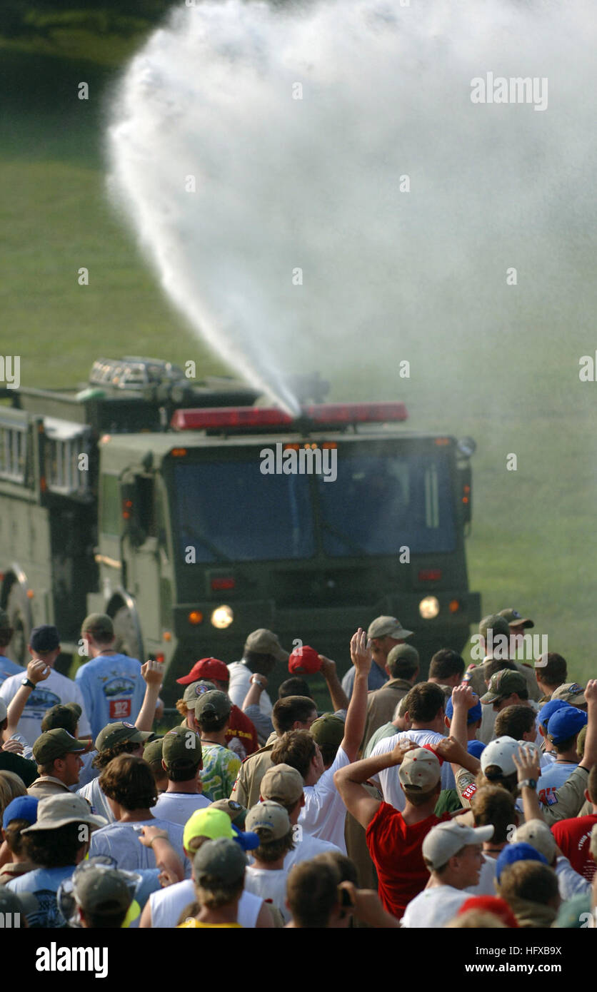 050726-N-9769P-009 Fort A.P. Hill, Va. (July 26, 2005) Ð A U.S. Army fire truck provides relief from the heat as thousands of Boy Scouts stand hoping to hear the President of the United Stated speak at their opening ceremony as part of the National Scout Jamboree held at Fort A.P. Hill, Va. Held every four years, thousands of Boy Scouts assemble from across the United States and the World for nine days to take part in the National Scout Jamboree to camp, earn merit badges and provide an educational program to build character, train for responsibilities and promote physical fitness. This year's Stock Photo