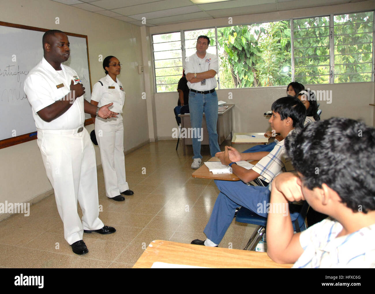 070502-N-9486C-001  COLON, Panama (May 2, 2007) - Hospital Corpsman 1st Class Charles Givens, Commander Task Group 40.9 Independent Duty Corpsman, explains his military decorations to the students at Colegio International Del Caribe international school while in port as part of the pilot Global Fleet Station. Commander, Task Group 40.9 (CTG 40.9) and High Speed Vessel (HSV) 2 Swift, are deployed as part of the pilot Global Fleet Station (GFS) to the Caribbean basin and Central America. Global Fleet Station is designed to validate the GFS concept for the Navy and support U.S. Southern Command o Stock Photo
