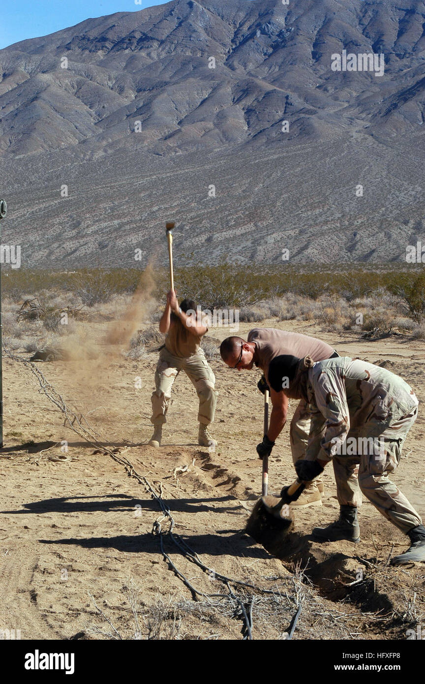 Sailors from Naval Coastal Warfare Squadron Five and Explosive Ordnance ...
