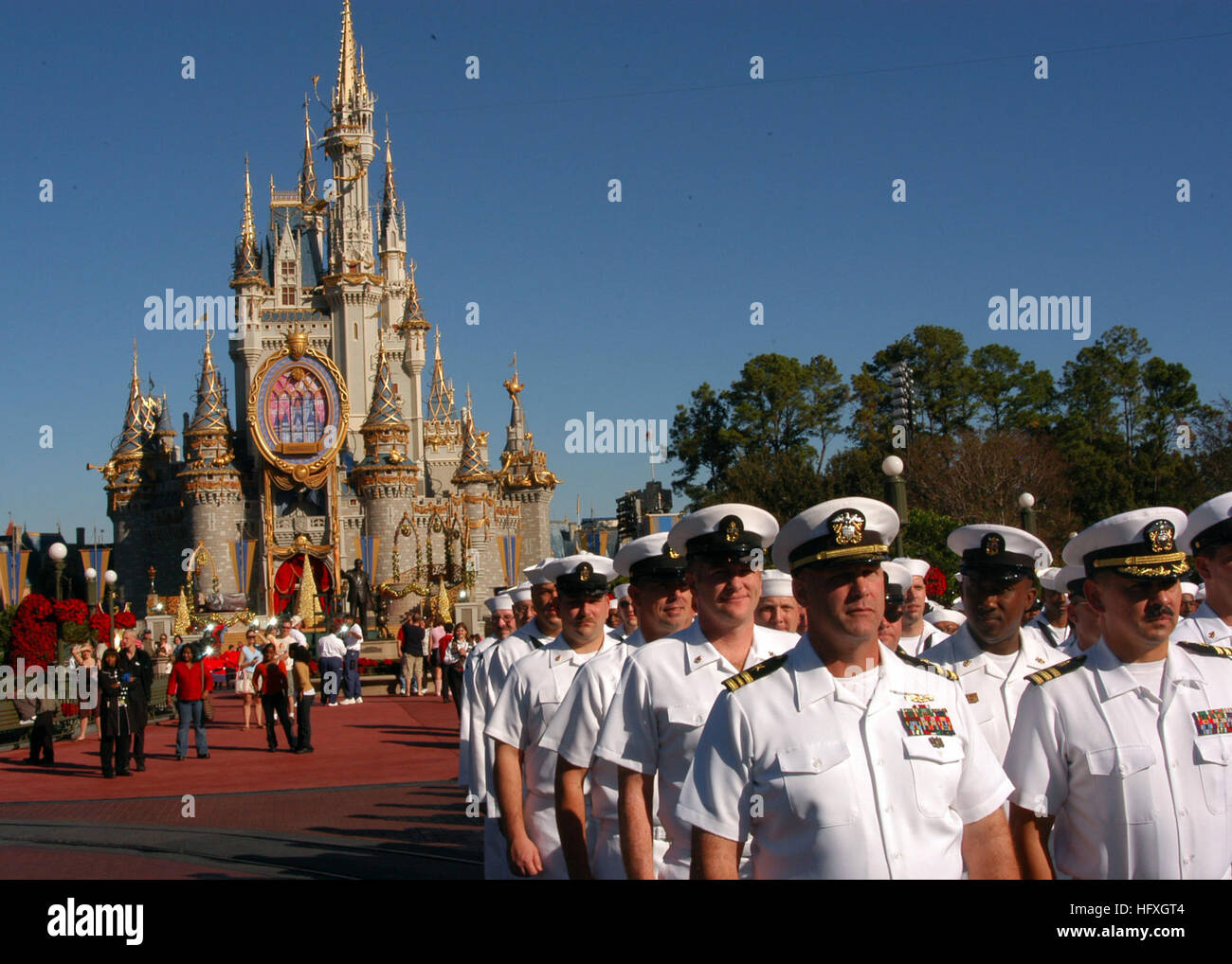051204-N-6645H-092 Orlando, Fla. (Dec. 4, 2005) - Sailors from various U.S. Navy commands throughout Navy's Southeast Region march before Cinderella's Castle before entering onto Main St. inside Walt Disney World's Magic Kingdom. The Sailors were greeted by family members and guests and joined Disney World's Military Salute for its 2005 Christmas Day Parade taping. U.S. Navy photo by PhotographerÕs Mate 3rd Class Adam J. Herrada (RELEASED) US Navy 051204-N-6645H-092 Sailors from various U.S. Navy commands throughout Navy's Southeast Region march before Cinderella's Castle before entering onto  Stock Photo