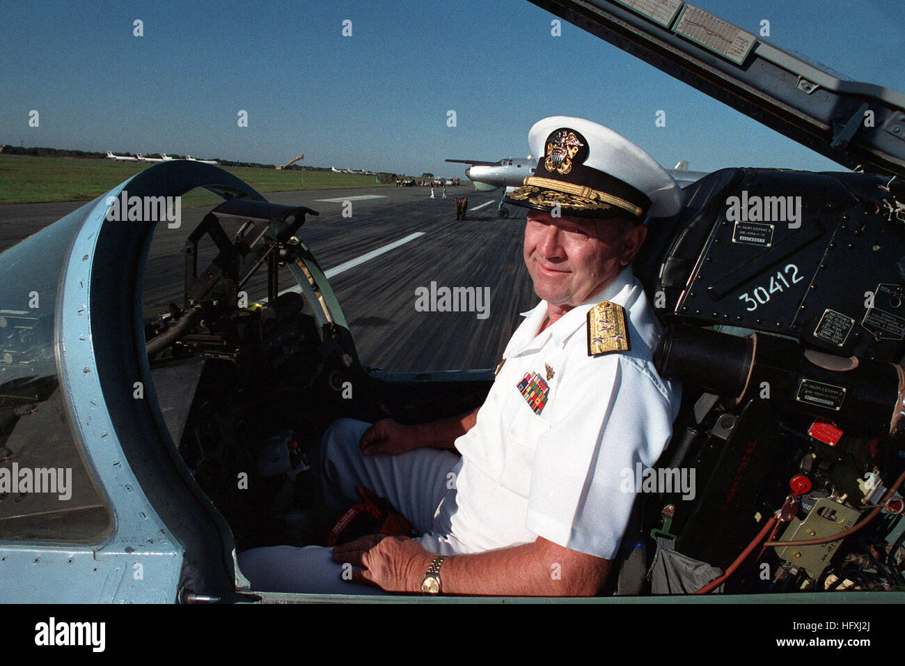 Vice Admiral John H. Fetterman Jr., Commander, Naval Air Force, US Pacific Fleet,  sits in the cockpit of a Soviet Su-27 Flanker aircraft during a visit to an air base.  Fetterman is in the Soviet Union with two US Navy ships, the guided missile cruiser USS PRINCETON (CG-59) and the guided missile frigate USS REUBEN JAMES (FFG 57), for a four-day goodwill visit. Vice Admiral John Fetterman Stock Photo