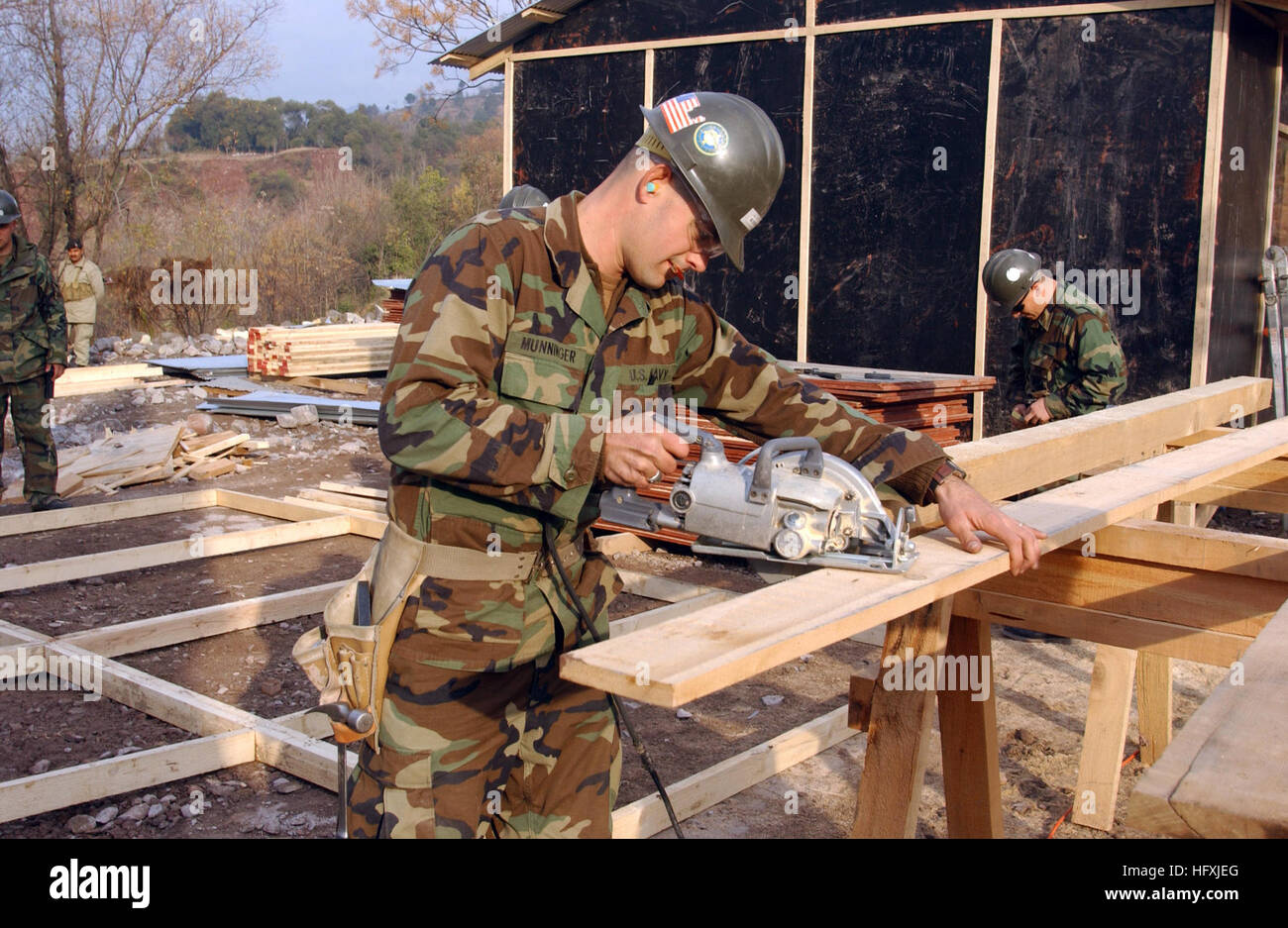 U.S. Navy SEABEEs from the Naval Mobile Construction Battalion build a