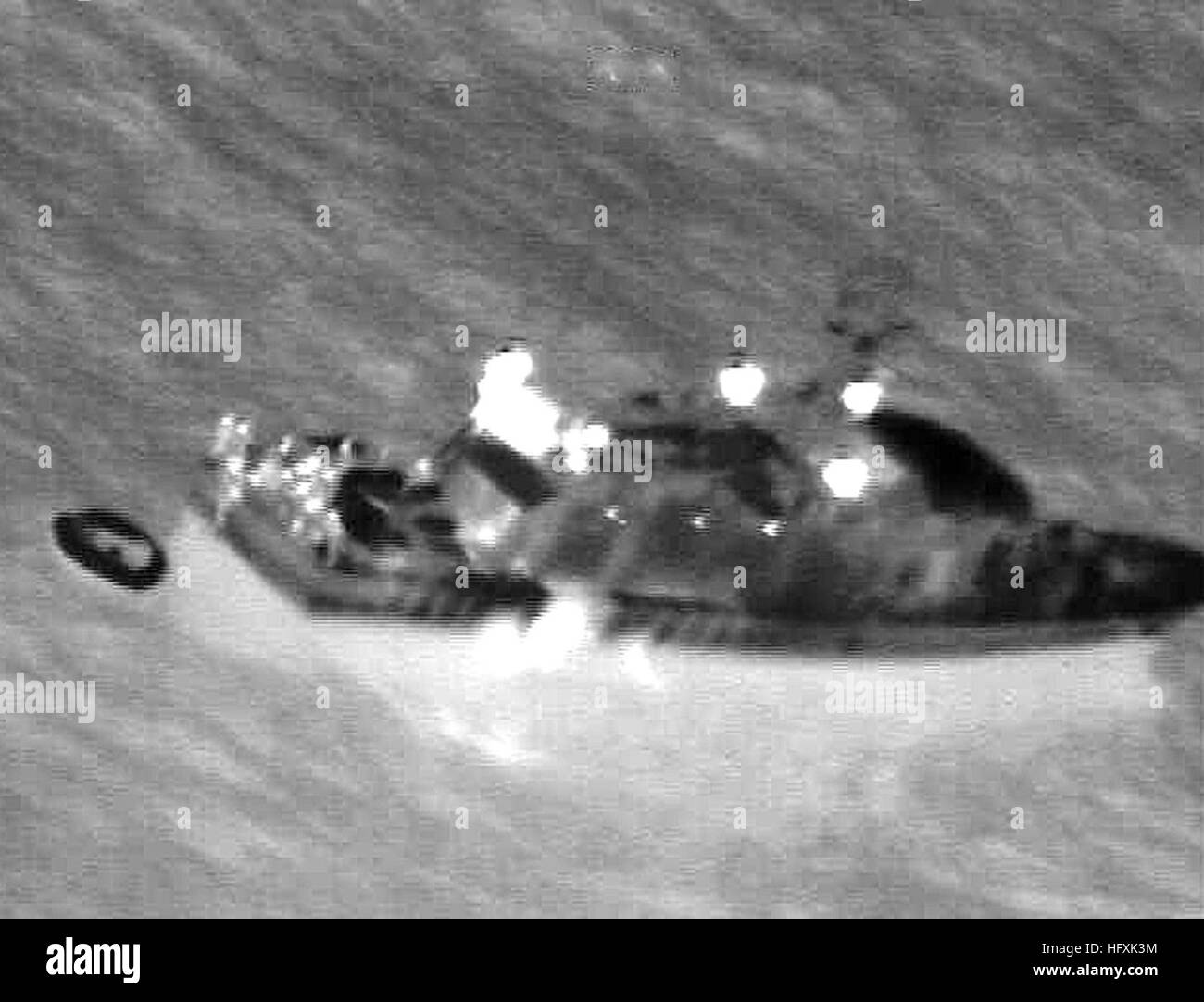 060204-N-0000N-003   RED SEA (Feb 4, 2006) - Infrared imagery taken from a U.S. Navy P-3C Orion maritime patrol aircraft, assisting in search and rescue operations for survivors of the Egyptian ferry Al Salam Boccaccio 98 in the Red Sea, shows a rescue vessel alongside a life raft.  The aircraft, assigned to the Golden Swordsmen of Patrol Squadron (VP-47), flew for almost 15 hours during the mission to assist local authorities in the search efforts.  VP-47 is homeported at Marine Corps Base Hawaii, Kaneohe Bay, and is currently supporting missions in the U.S. Central Command (USCENTCOM) area o Stock Photo