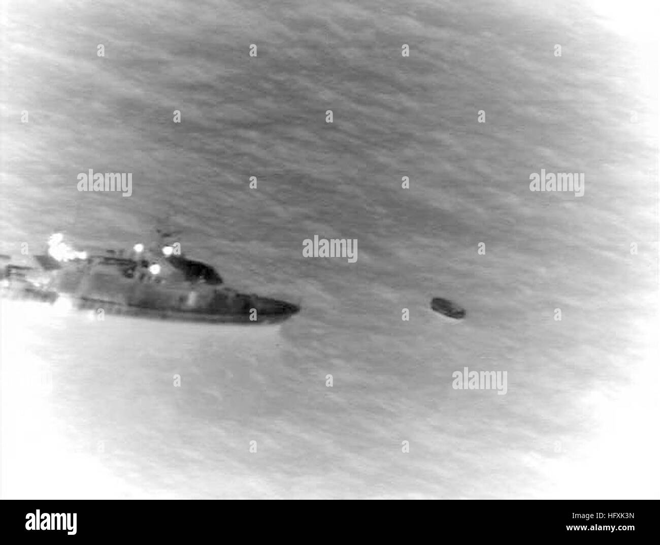 060204-N-0000N-004  RED SEA (Feb 4, 2006) - Infrared imagery taken from a U.S. Navy P-3C Orion maritime patrol aircraft, assisting in search and rescue operations for survivors of the Egyptian ferry Al Salam Boccaccio 98 in the Red Sea, shows a rescue vessel alongside a life raft.  The aircraft, assigned to the Golden Swordsmen of Patrol Squadron (VP-47), flew for almost 15 hours during the mission to assist local authorities in the search efforts.  VP-47 is homeported at Marine Corps Base Hawaii, Kaneohe Bay, and is currently supporting missions in the U.S. Central Command (USCENTCOM) area of Stock Photo