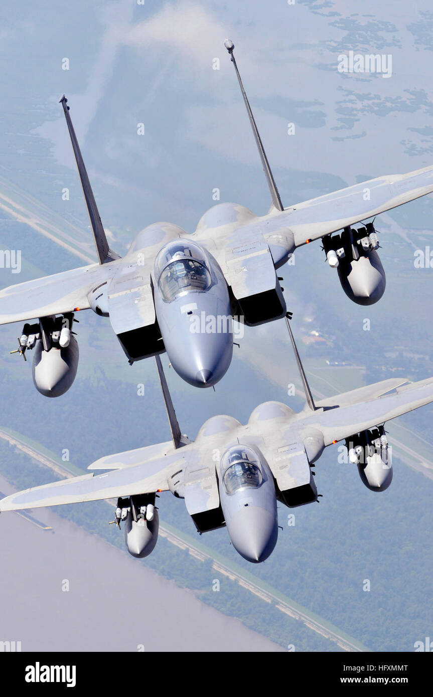 090711-N-9712C-012 NEW ORLEANS (July 11, 2009) Two F-15 Strike Eagles assigned to the Louisiana Air National Guard 159th Fighter Wing fly over southern Louisiana's wetlands during a photo exercise. The 159th is stationed on Naval Air Station Joint Reserve Base, New Orleans. (U.S. Navy photo by Mass Communication Specialist 2nd Class John P. Curtis/Released) US Navy 090711-N-9712C-012 Two F-15 Strike Eagles assigned to the Louisiana Air National Guard 159th Fighter Wing fly over southern Louisiana's wetlands during a photo exercise Stock Photo