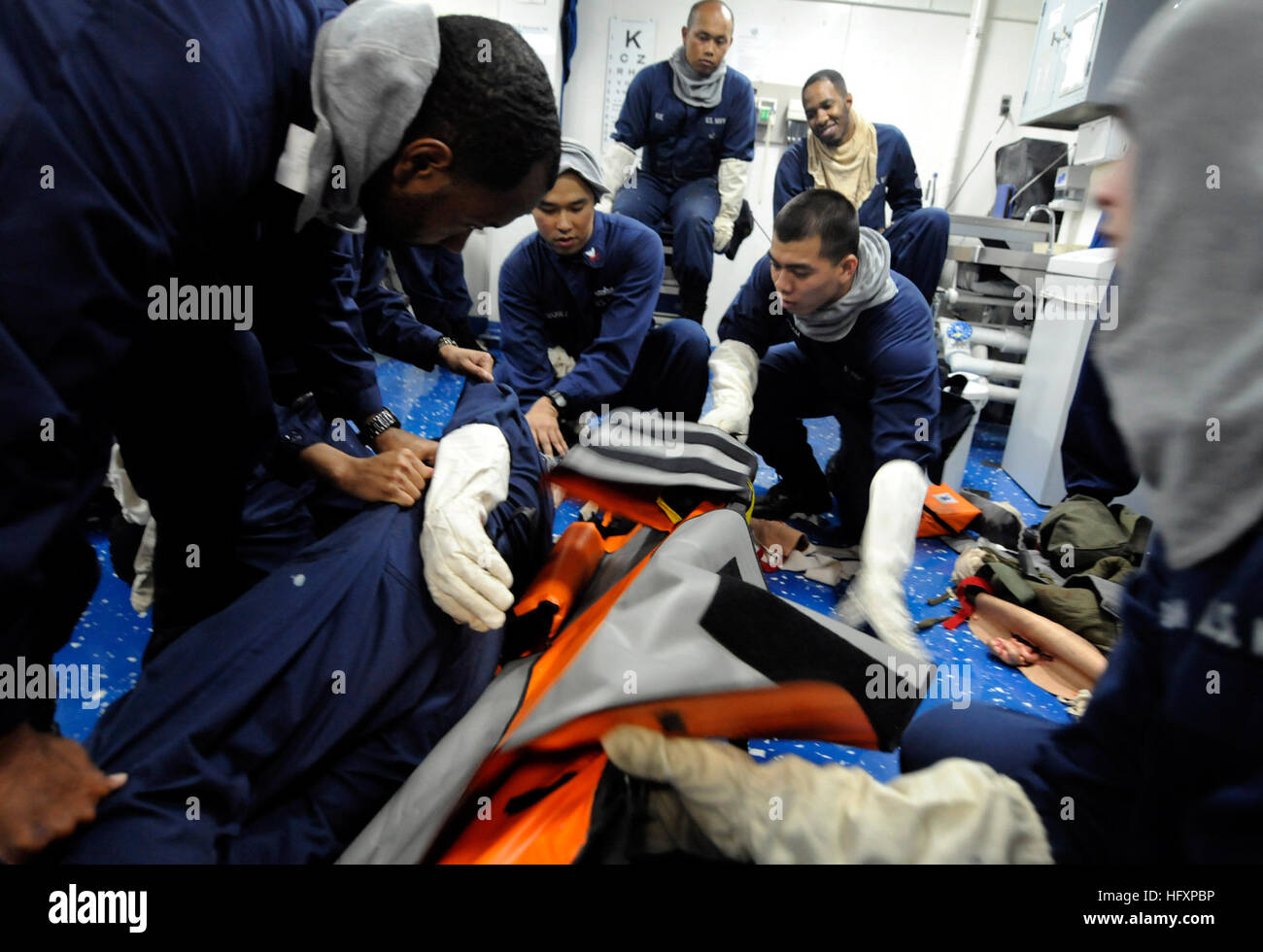 Sailors aboard USS Blue Ridge conduct casualty handling and stretcher ...