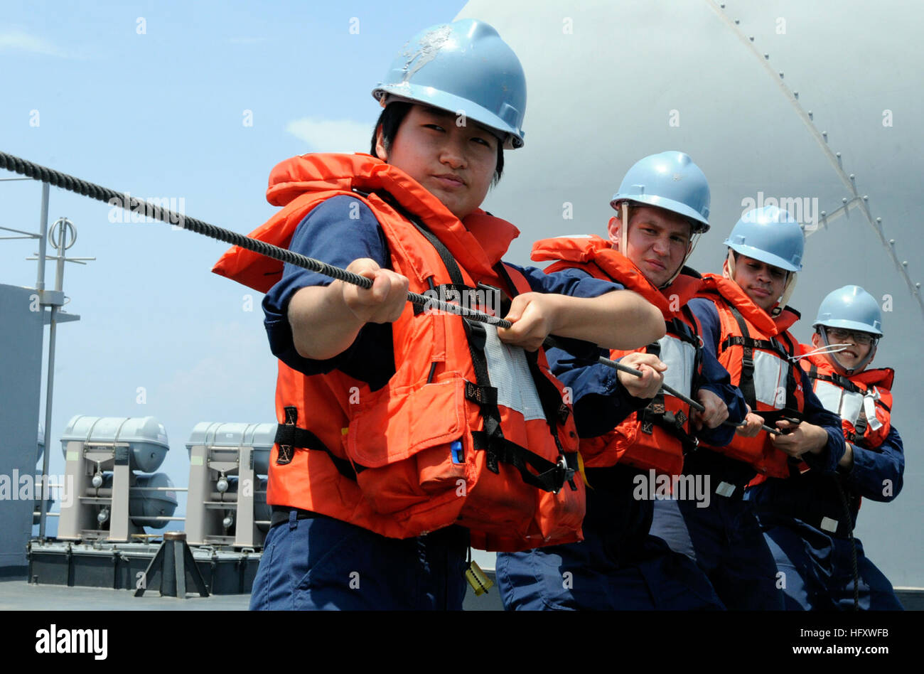 Line handlers aboard USS Blue Ridge manage the phone and distance line ...