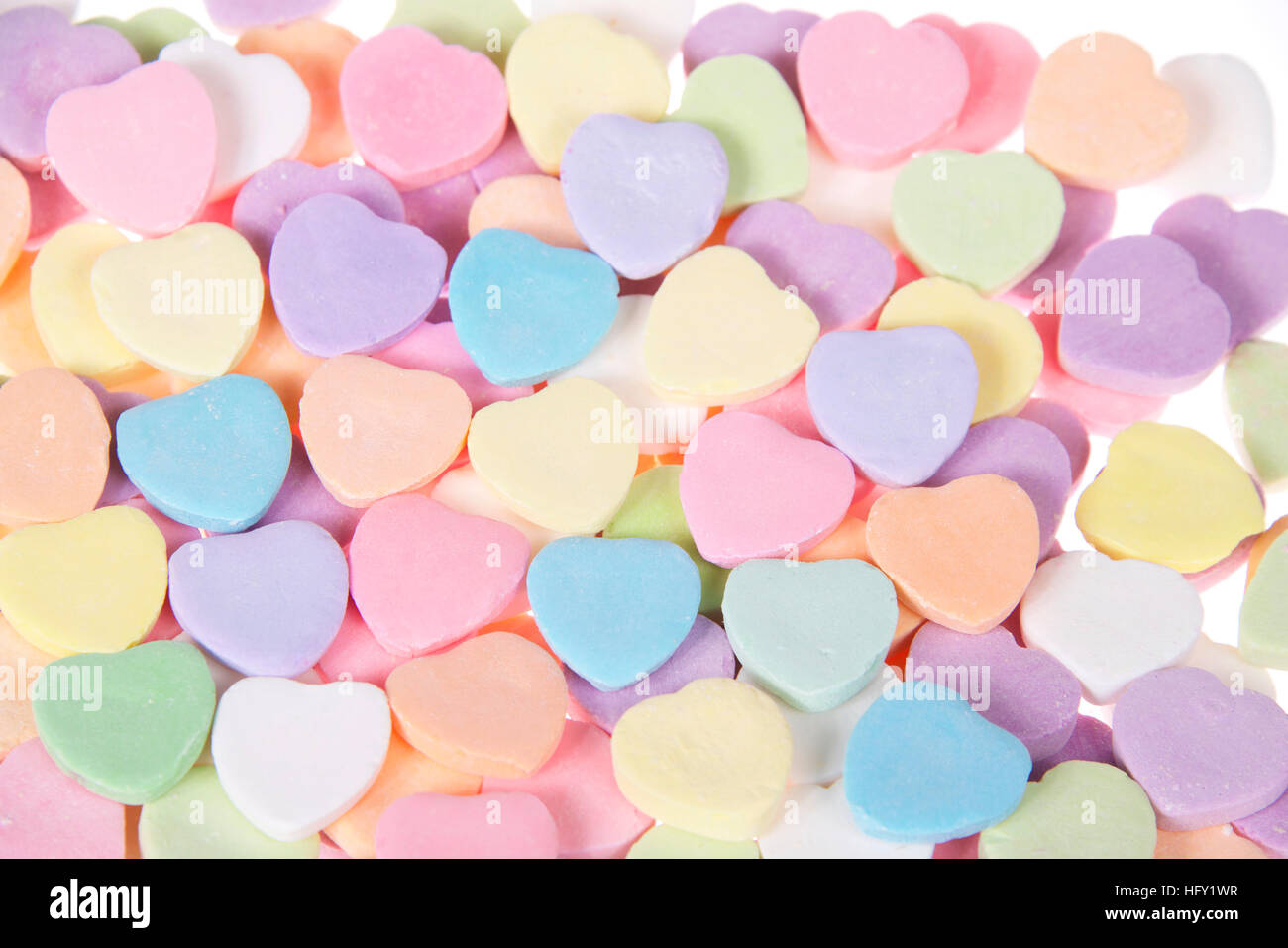 Close up of Pastel Candy Hearts on White Background for Valentine's Day.  Blank for your message Stock Photo - Alamy